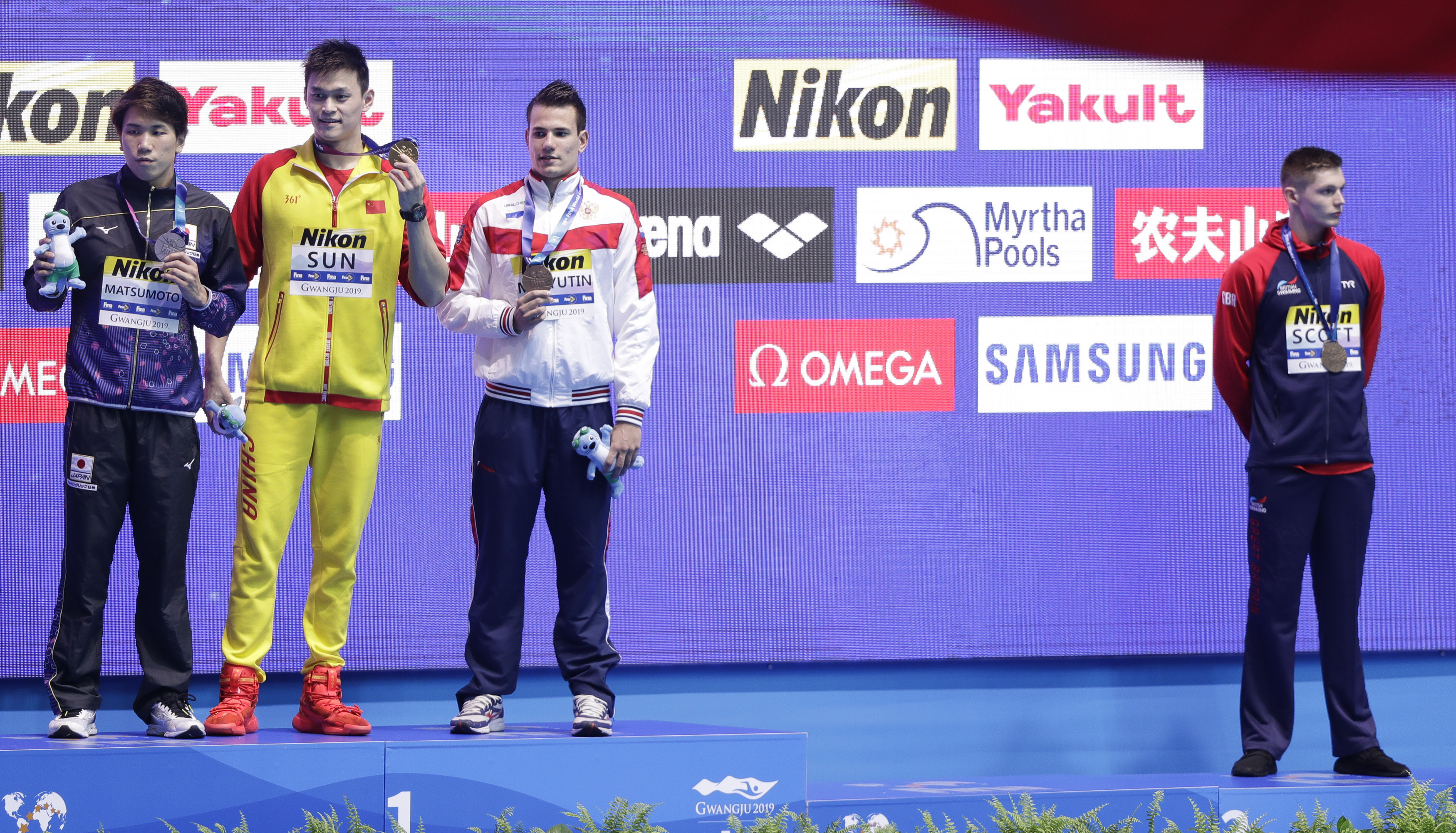China's Sun wins 200 free via DQ, gets shunned on podium