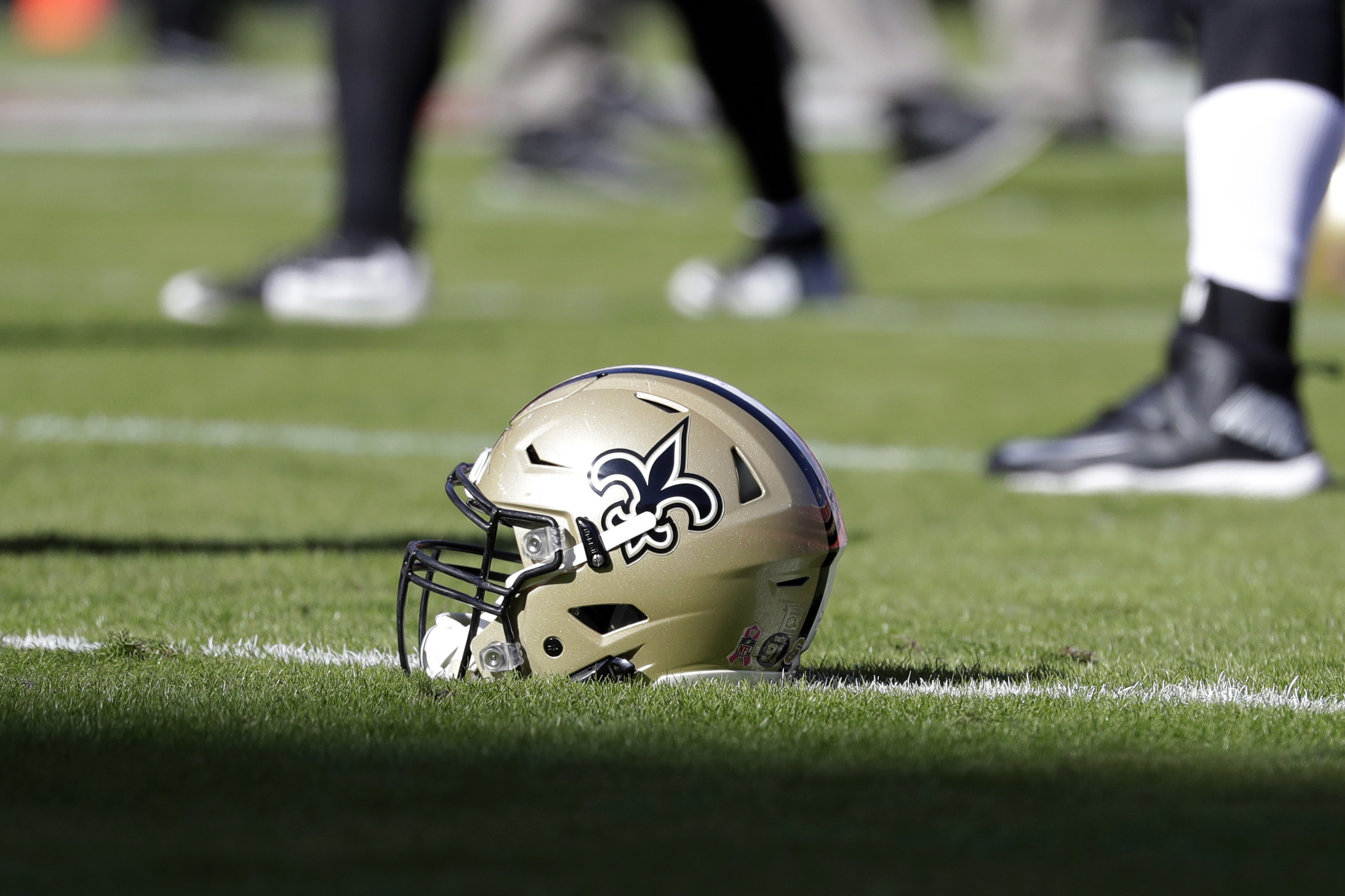 NFL's Saints seek to shield PR help to church in sex crisis 