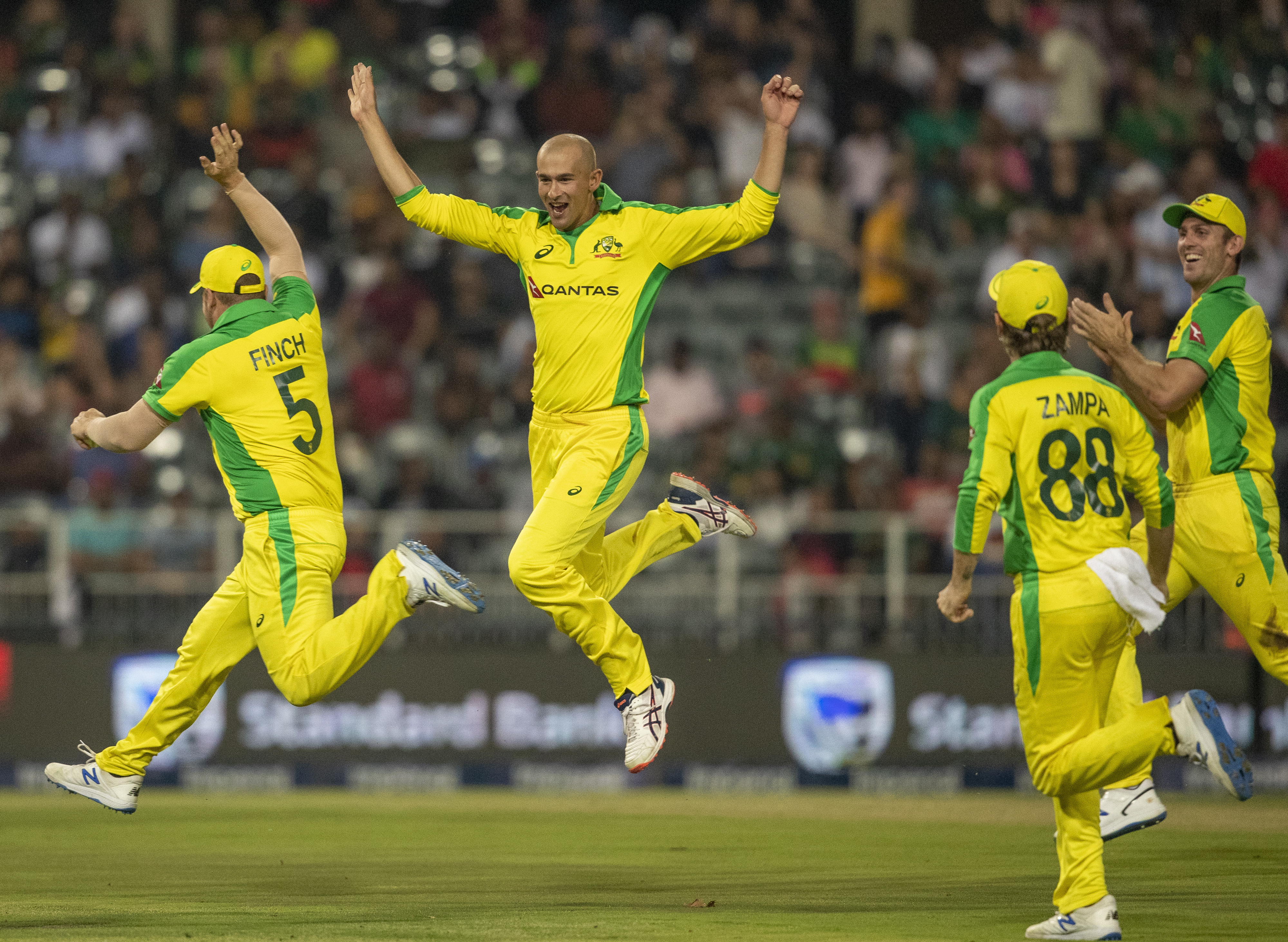 Agar hat trick, Australia thumps SA on return after scandal
