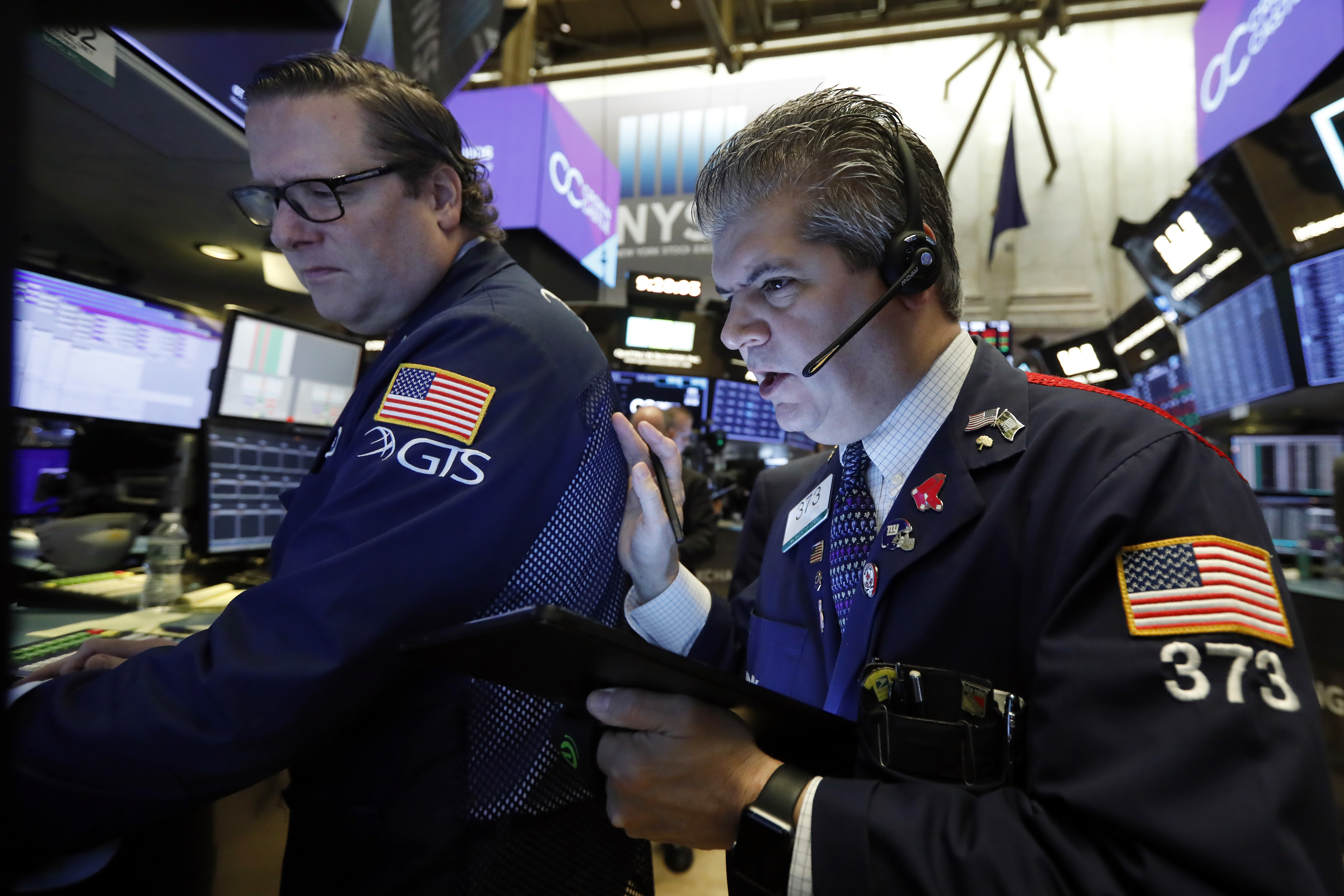 Stocks wobble as investors listen for trade deal clues