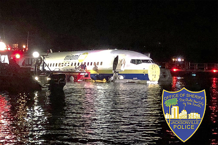 Plane with 143 aboard crashes into Florida river, no deaths