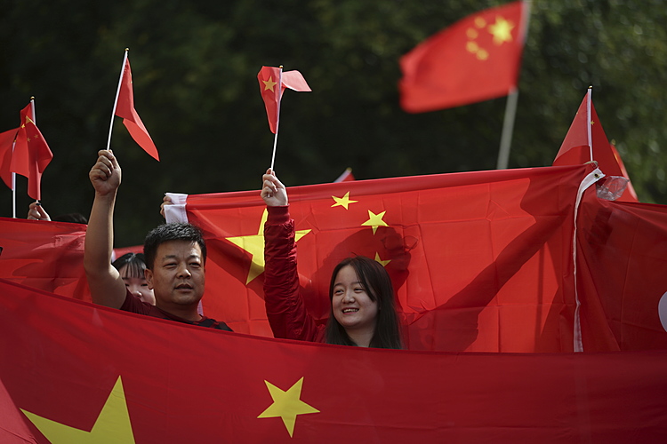 Ties to China shape cautious reaction to Hong Kong protests