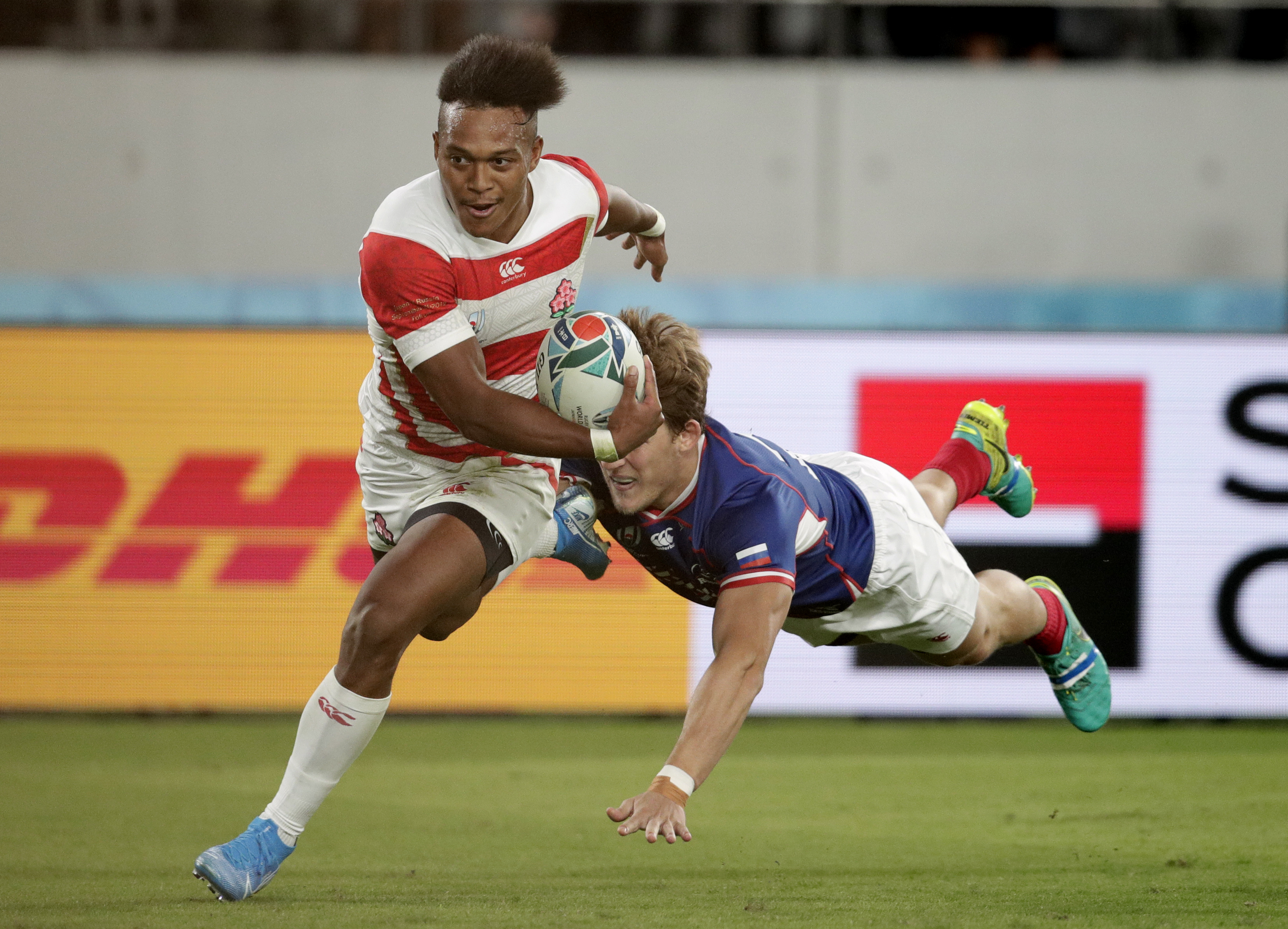 The Latest: Japan beats Russia 30-10 in World Cup opener