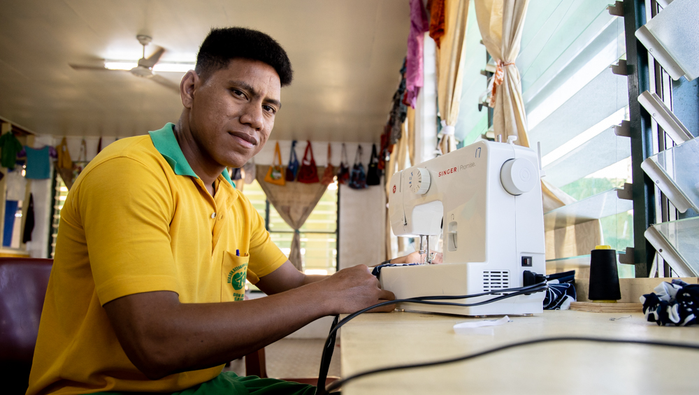 Young man has sewing stereotypes in sights