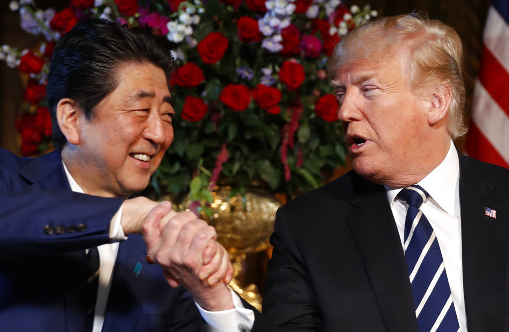 Iran's president trounces hard-liner to secure second term