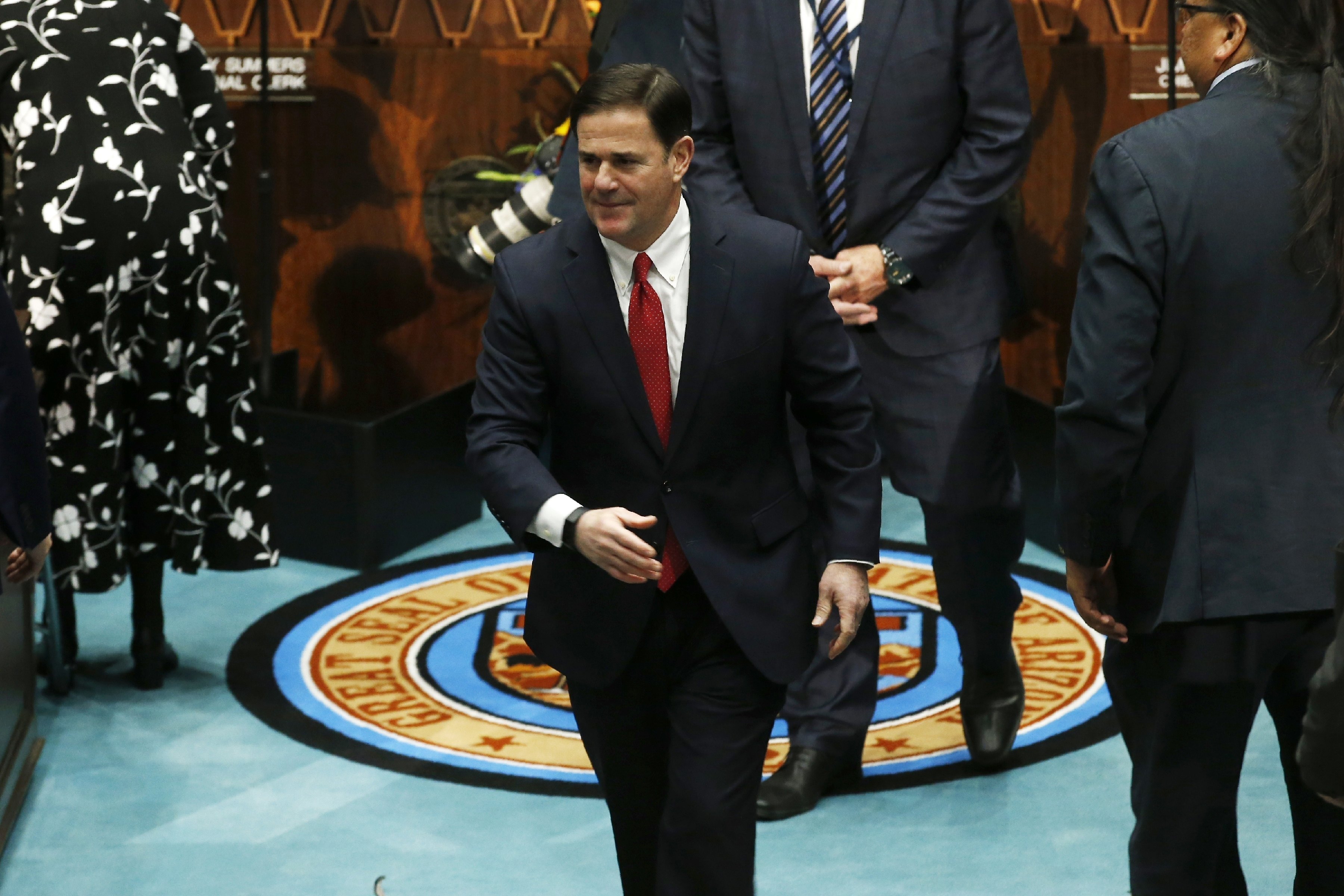 Arizona governor pulls immigration plan amid business revolt