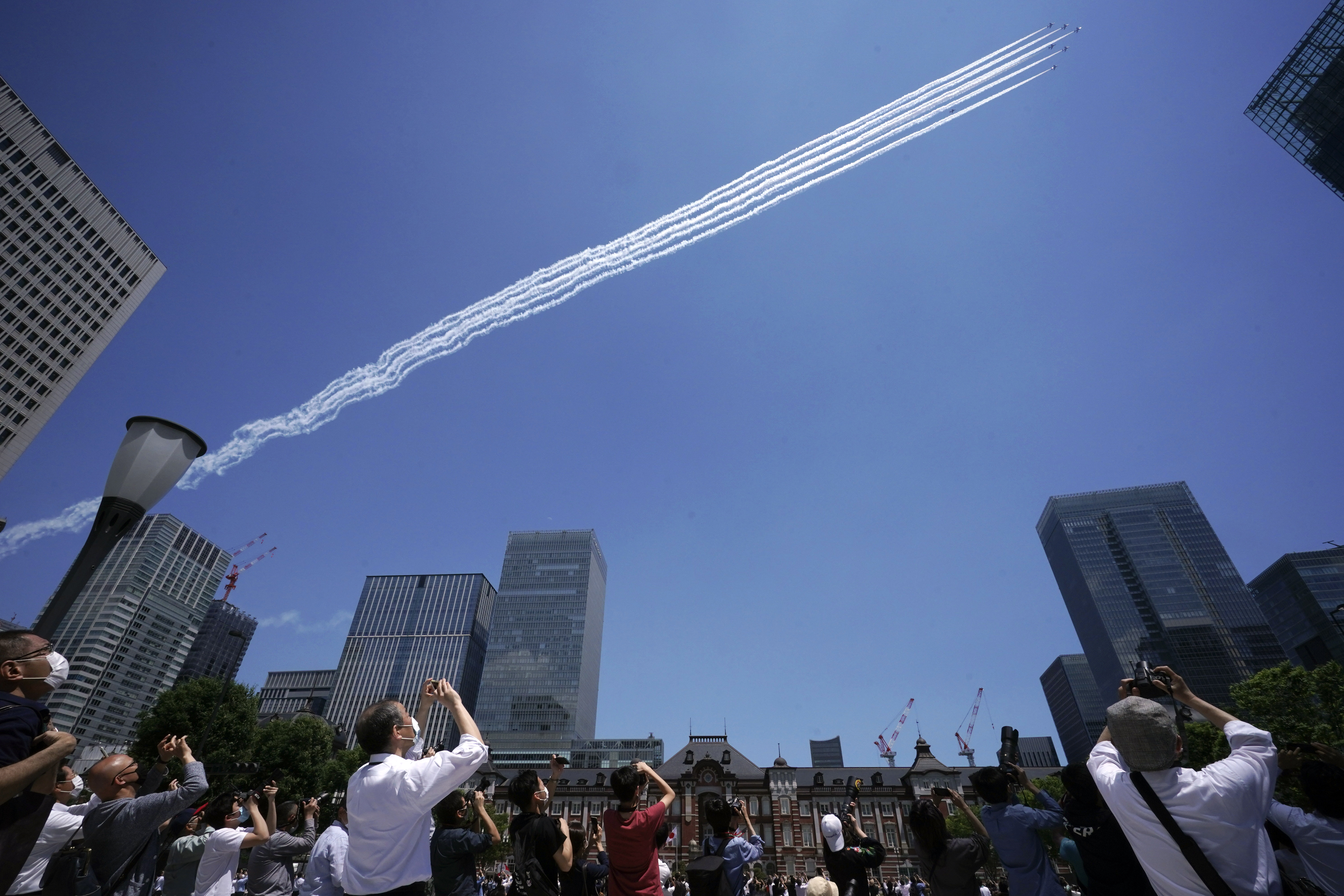 Asia Today: Indonesians return to mosques, at a distance
