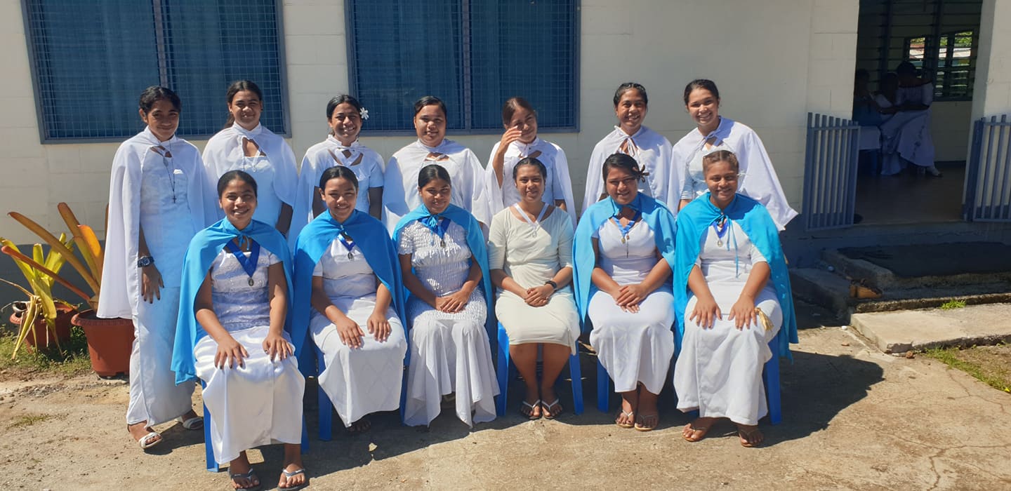Young girls pledge to serve Holy Mother Mary