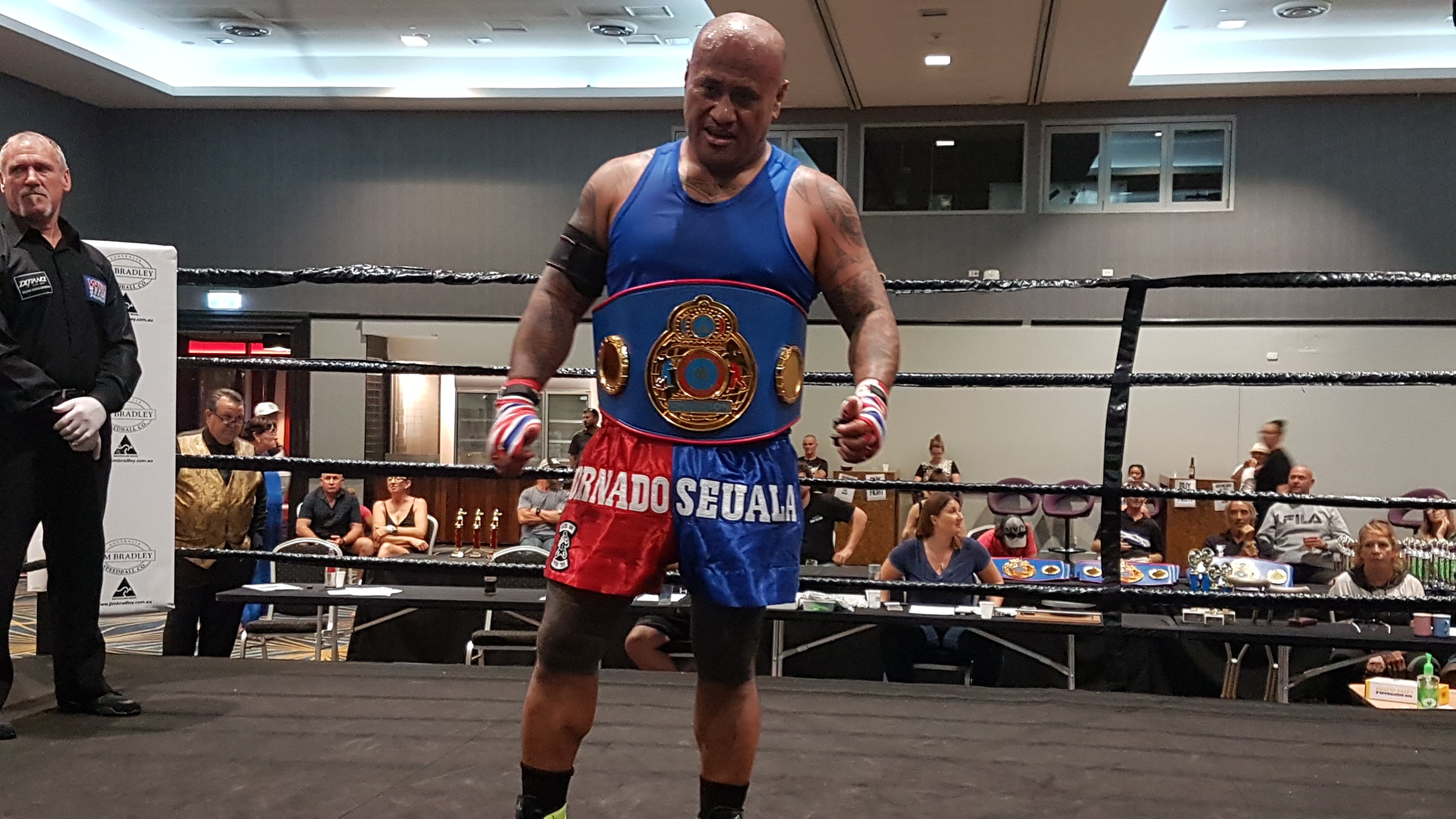 Boxing champ hopes to honour parents with title belt