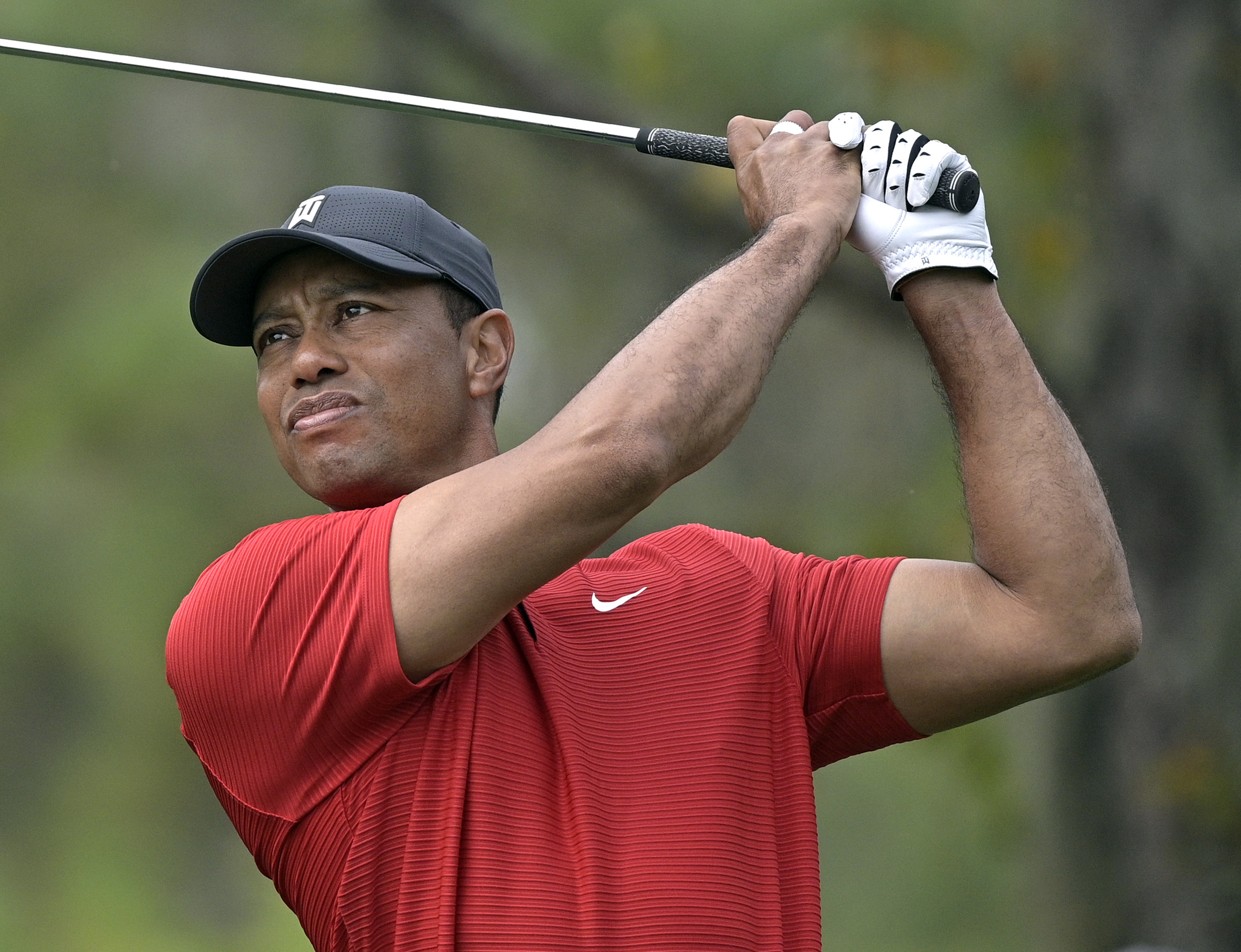 Woods says a return to the top not a 'realistic expectation'