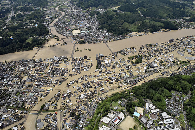 Heavy rain floods southern Japan; 2 dead, about 10 missing