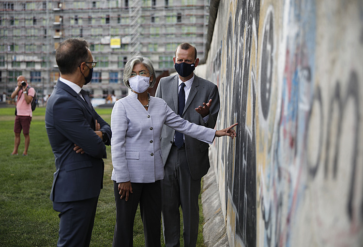 The Latest: German official urges globally available vaccine