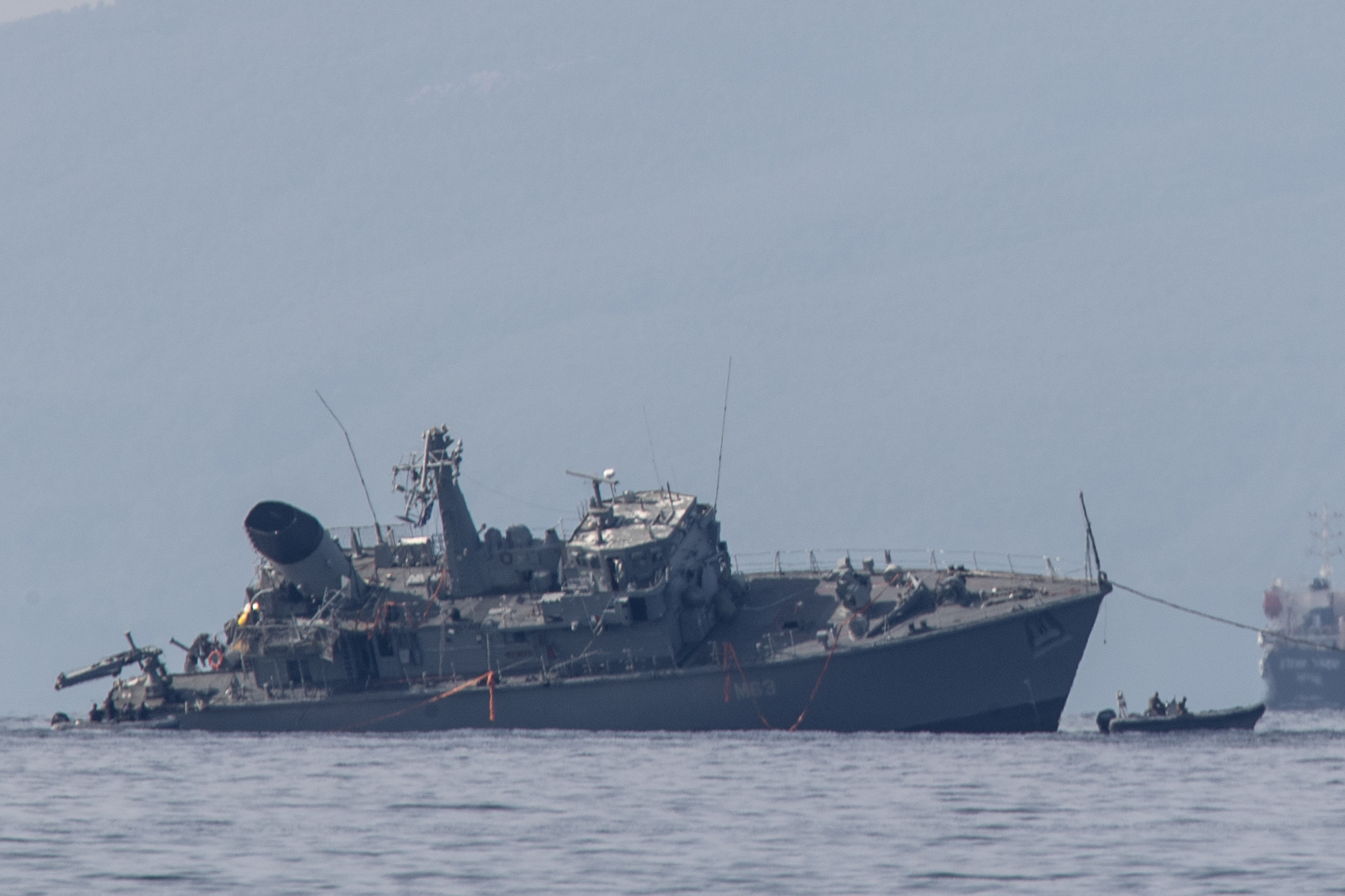 Greek navy minesweeper damaged after cargo ship collision