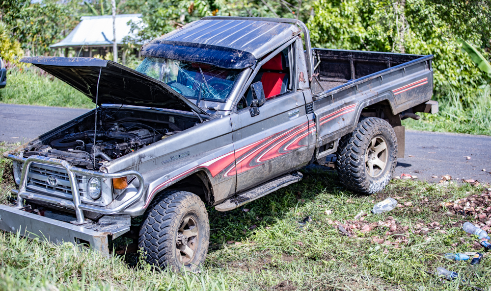 Truck flips but passengers escape serious injury