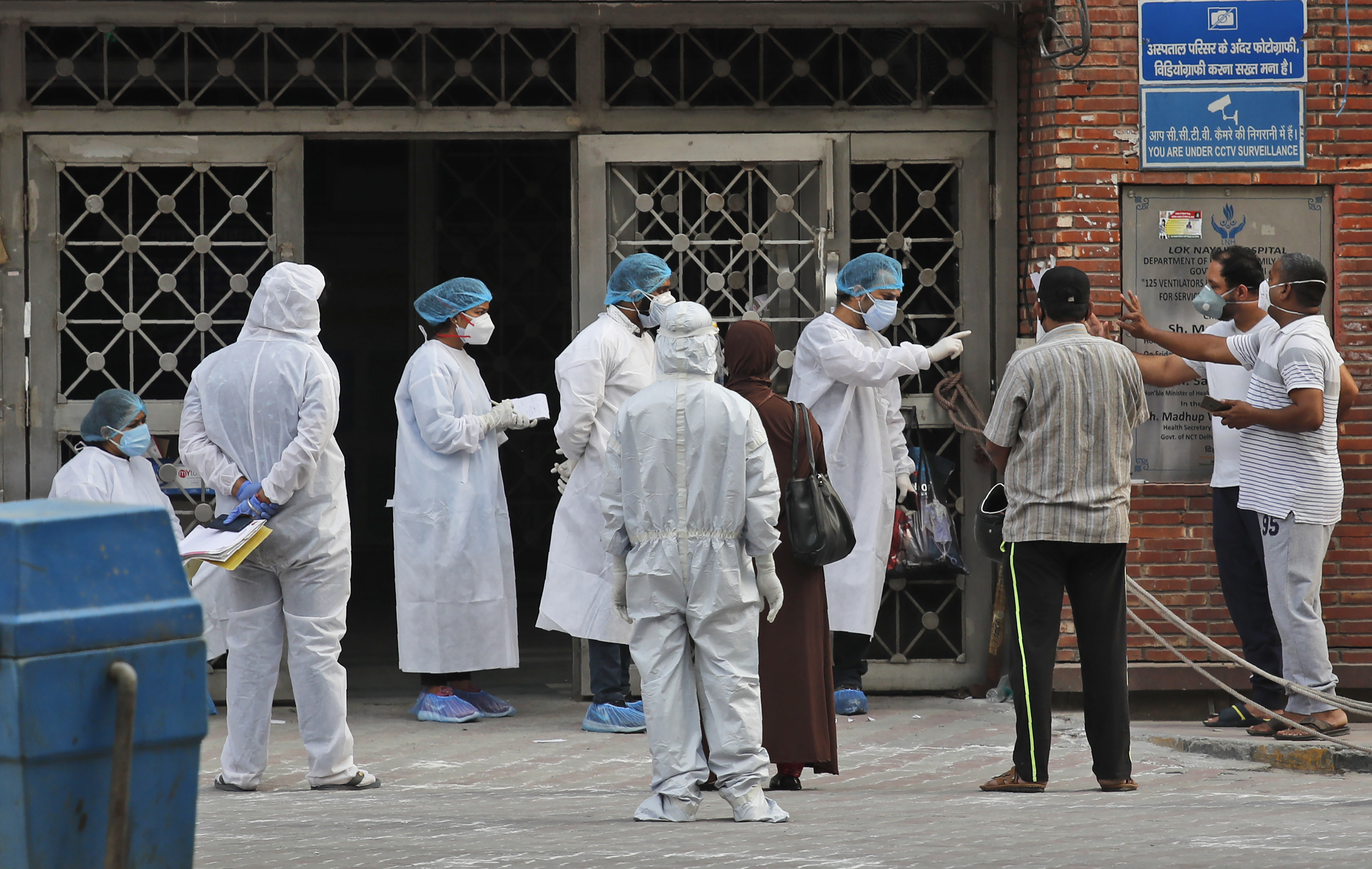 Asia Today: New Delhi reverses limits on testing, sickbeds