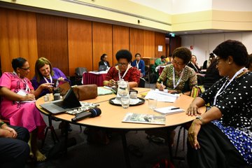 Minister abroad as measles spreads