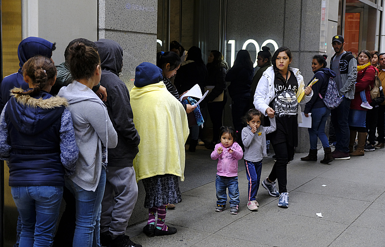 Judges block green card denials for immigrants on public aid