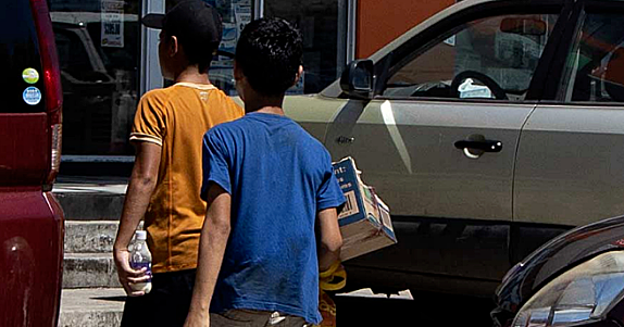 Drawing a line under child street vending