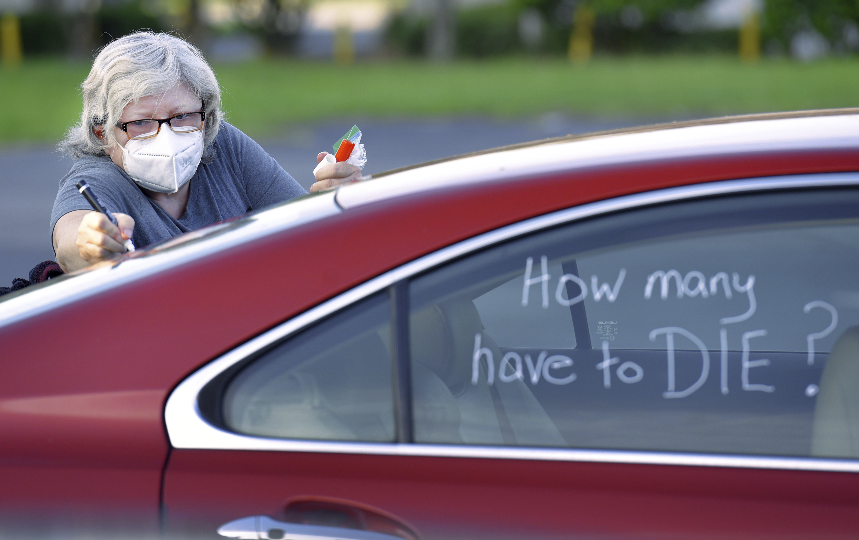 The Latest: Parents in Florida want schools open when 'safe'