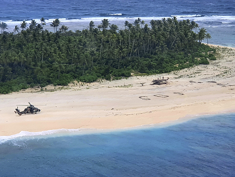 3 men rescued from Pacific island after writing SOS in sand
