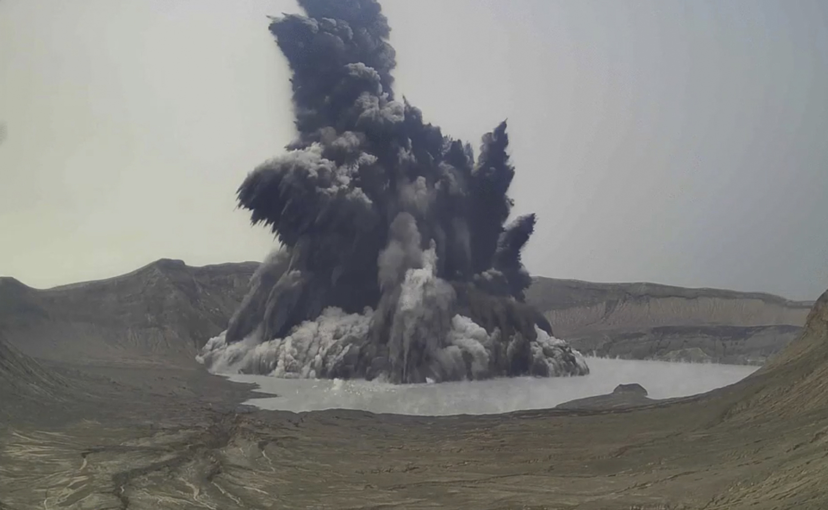 Philippine volcano belches dark plume, villagers evacuated 