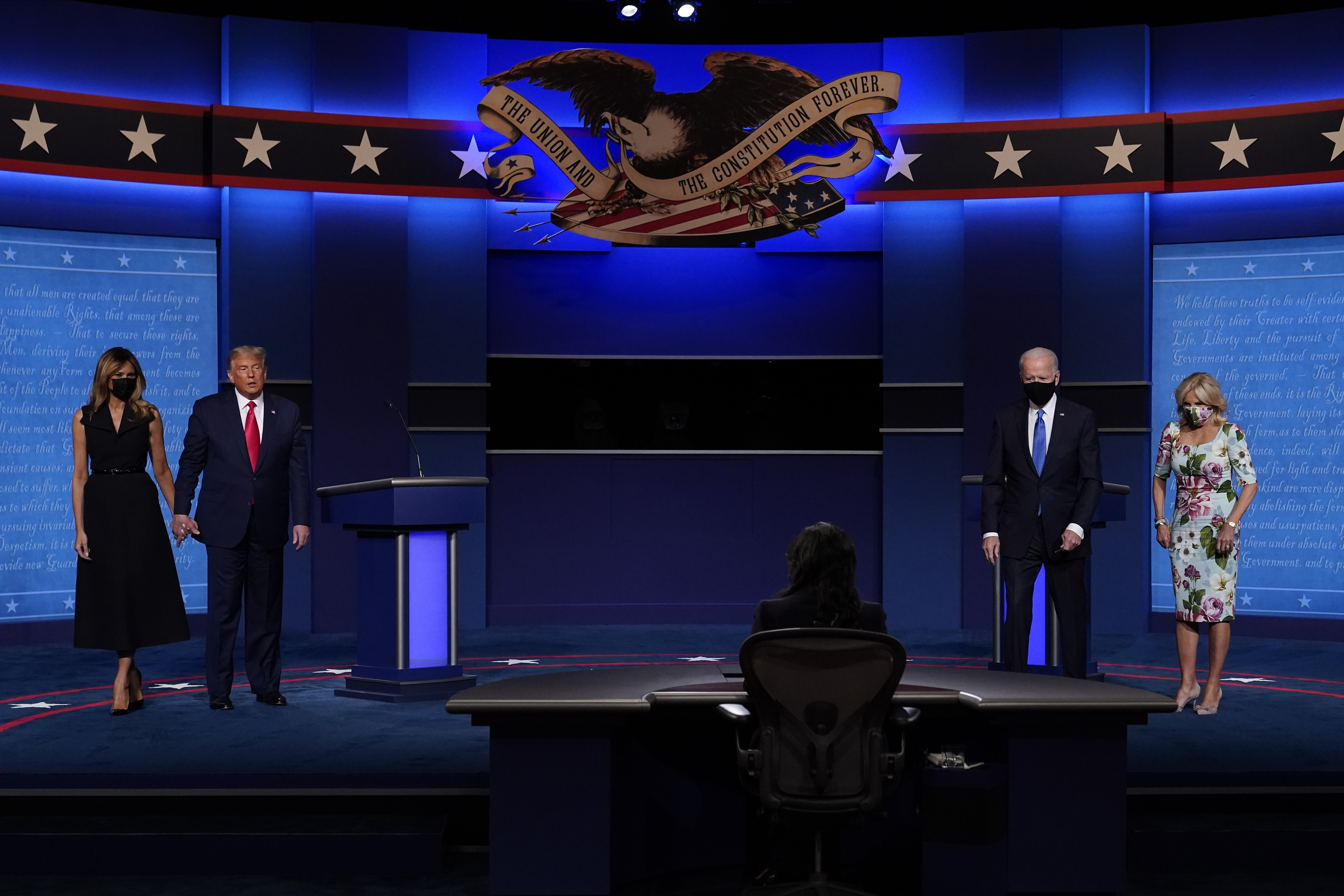 The Latest: Final debate ends on different tone than 1st one