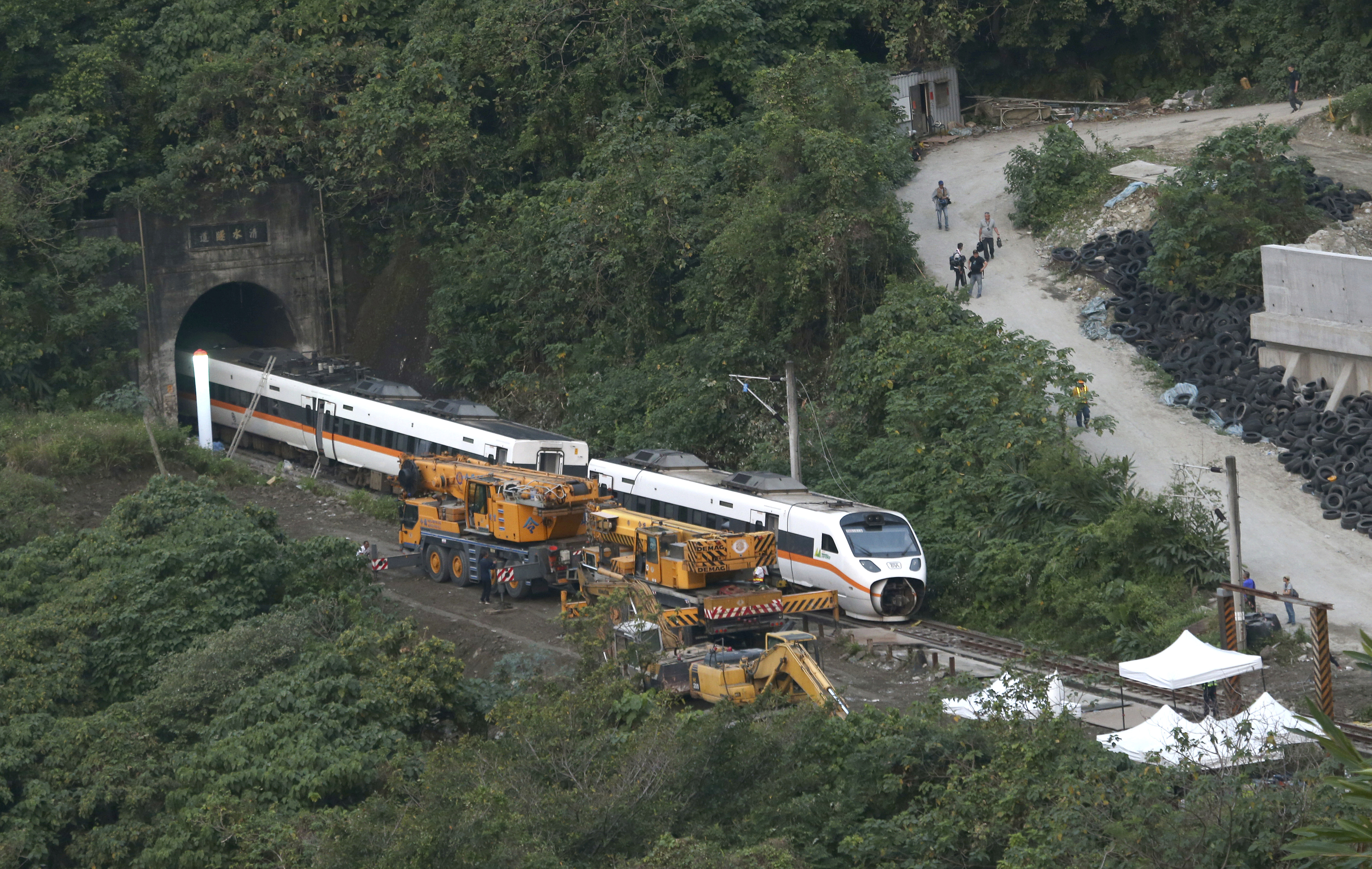 Taiwan prosecutors probe train crash that killed 51 