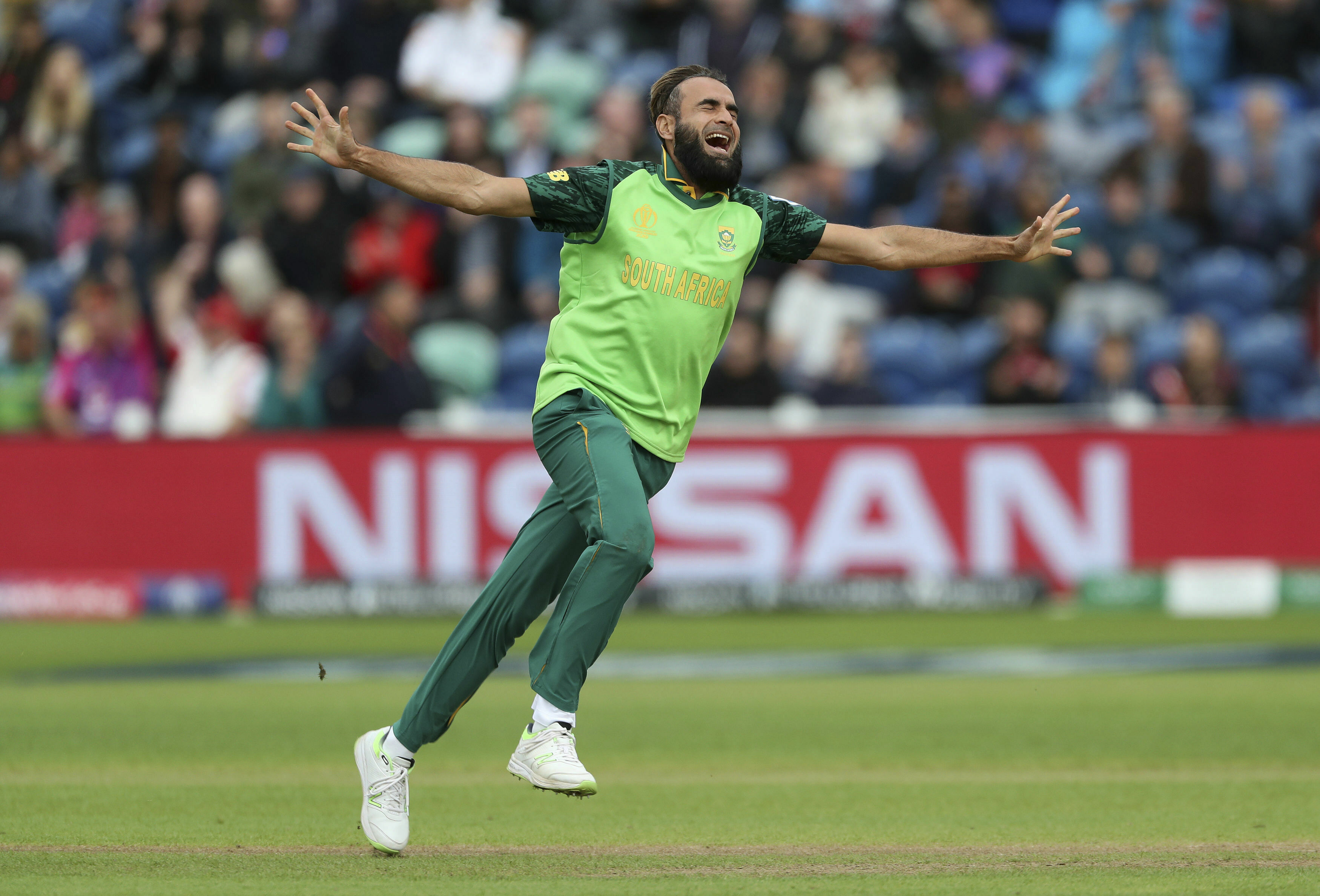 The Latest: Afghans collapse post rain break against SAfrica