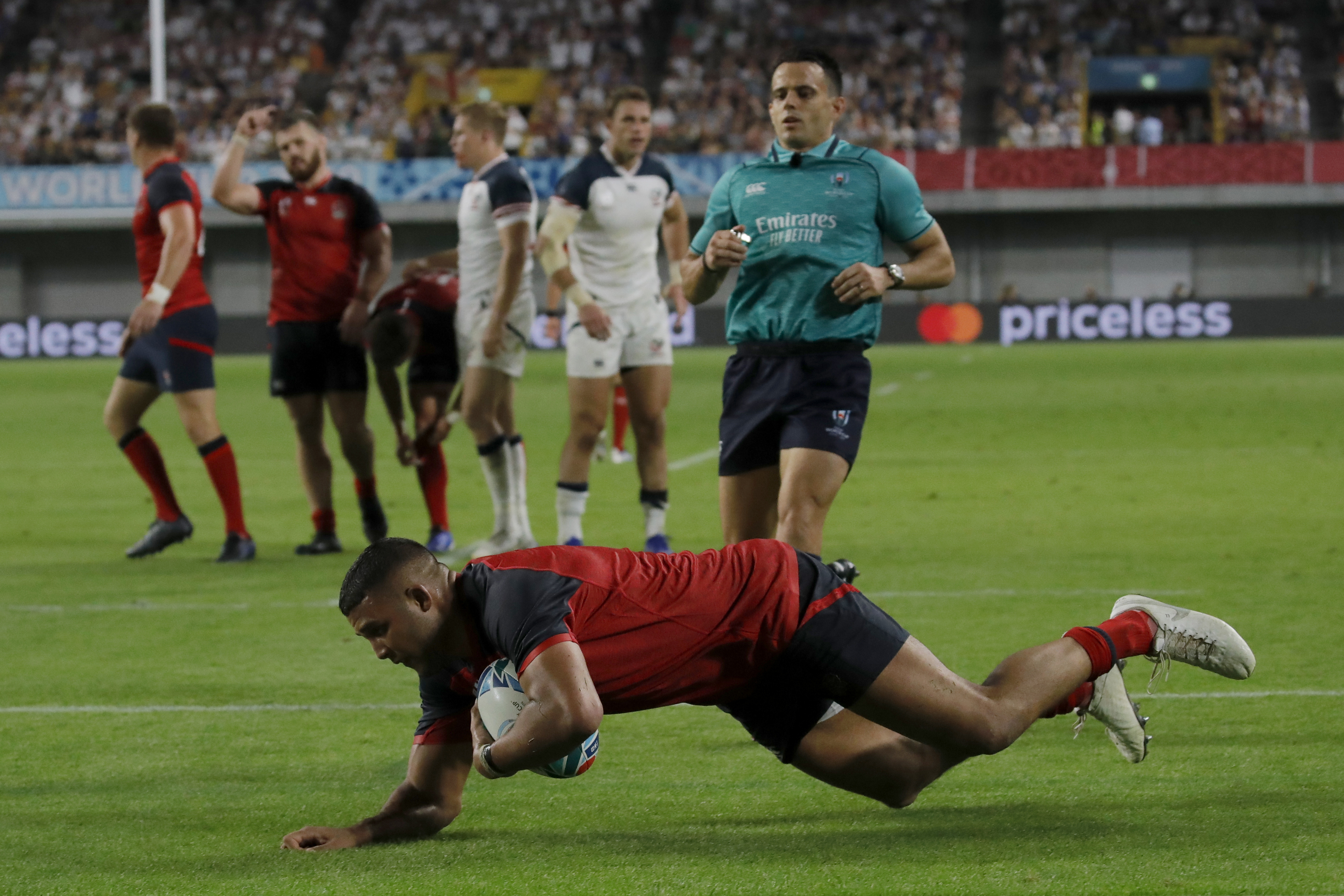 The Latest: England beats US 45-7