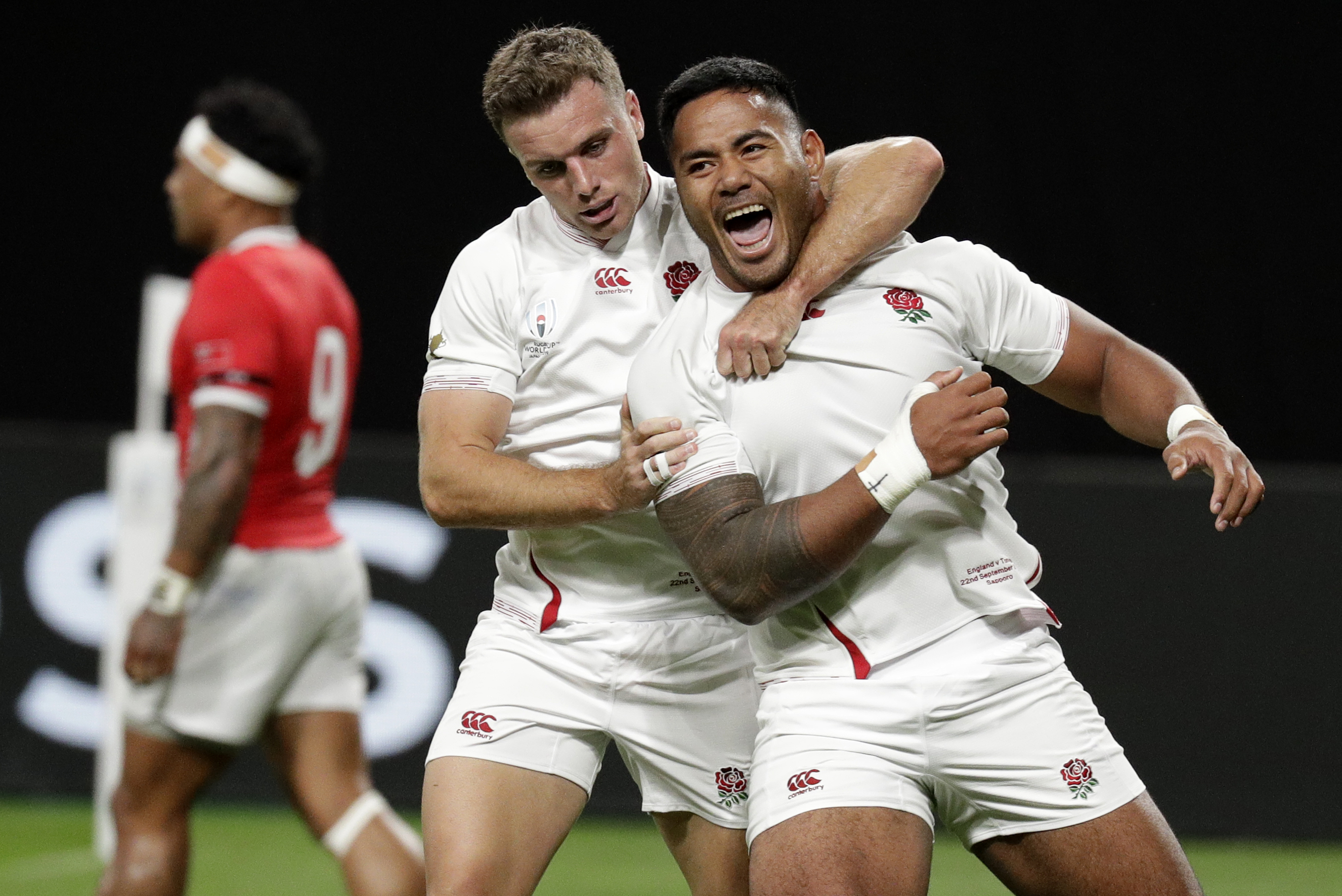 The Latest: 2 Tuilagi tries put England ahead 18-3 vs Tonga