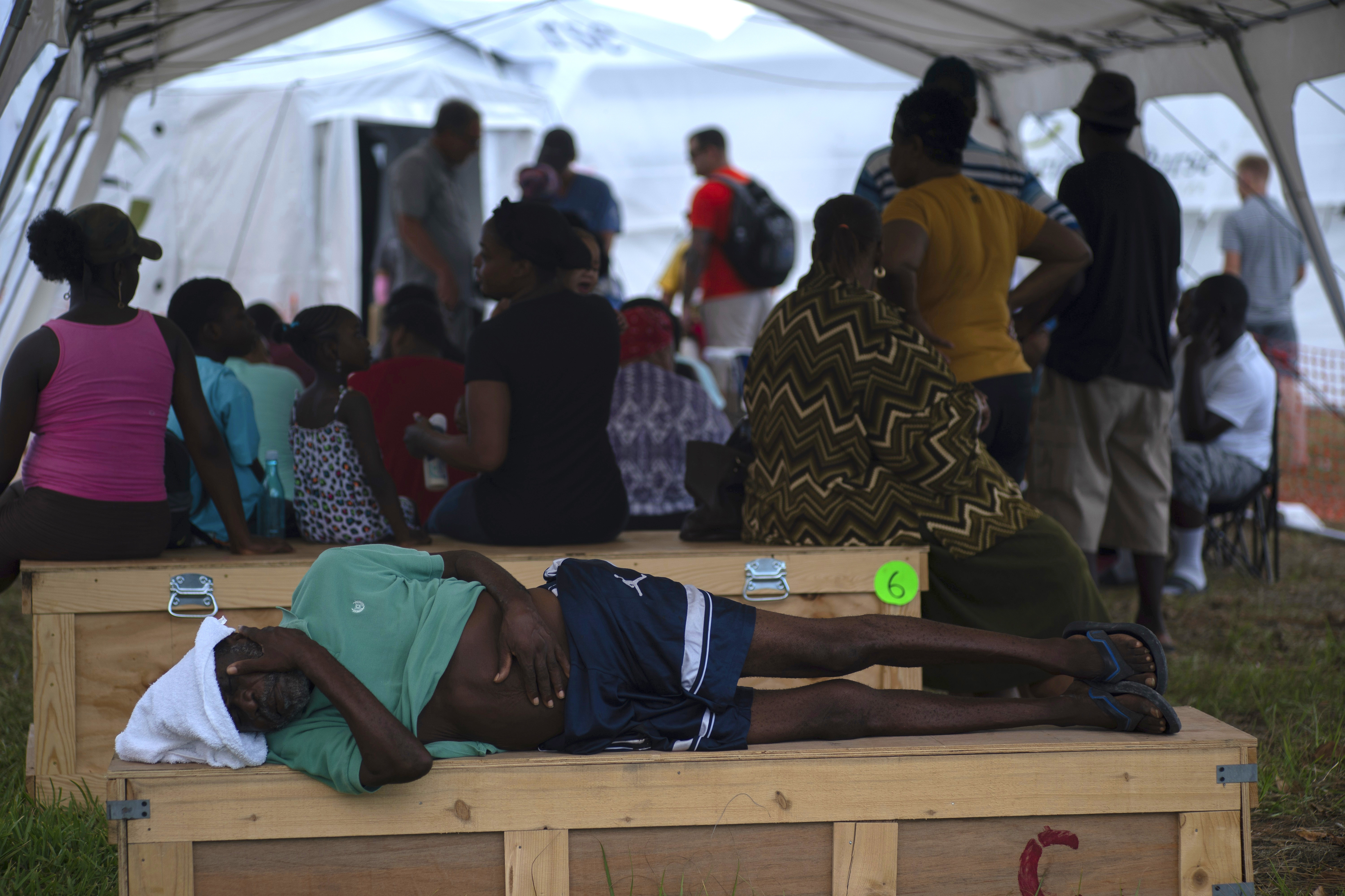 Desperation mounts in Bahamas as shelters turn evacuees away