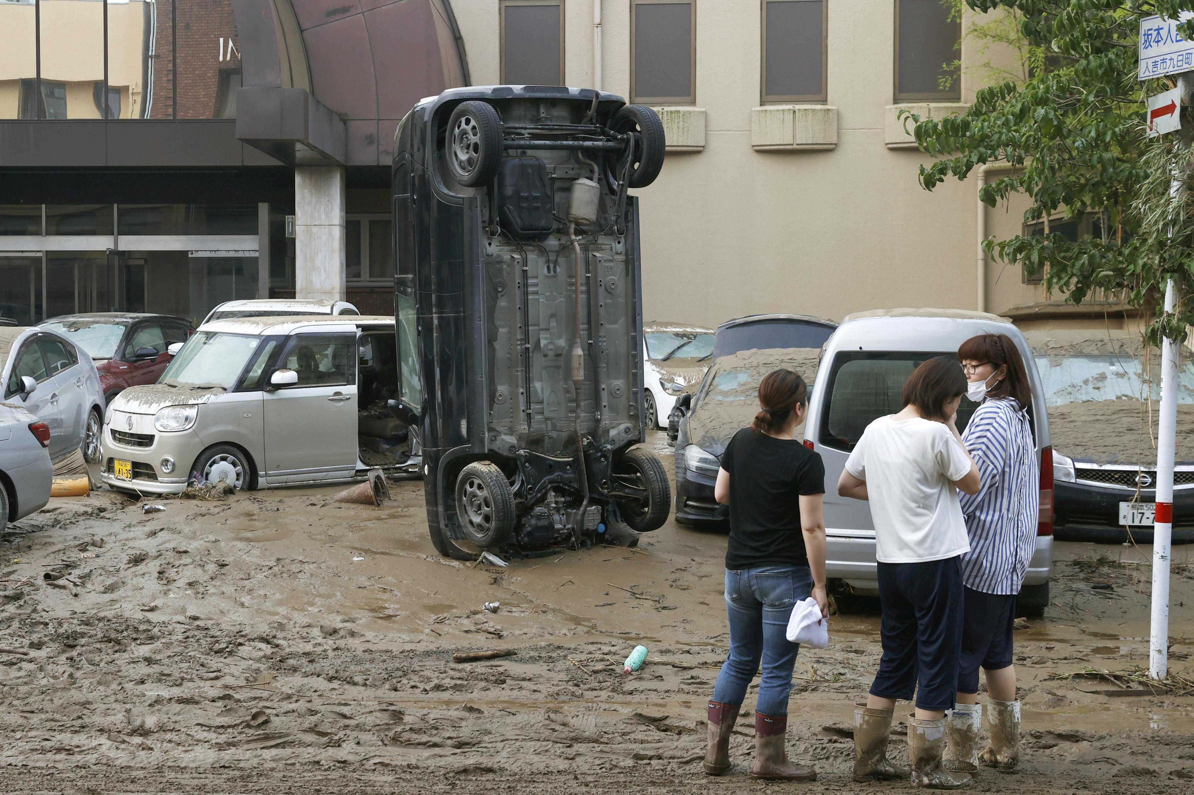 Japan floods leave up to 34 dead, many at nursing homes