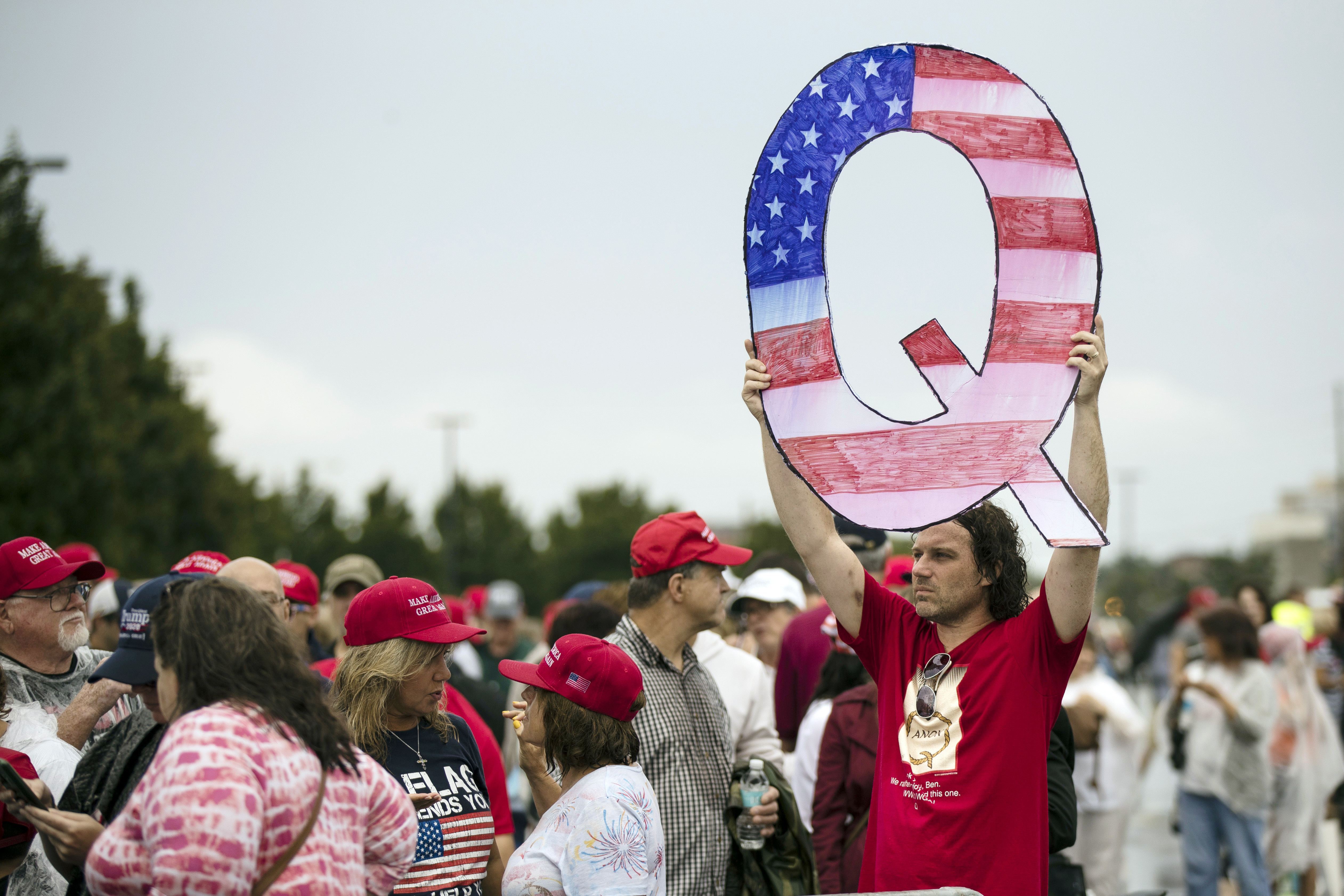 Facebook, Twitter flounder in QAnon crackdown