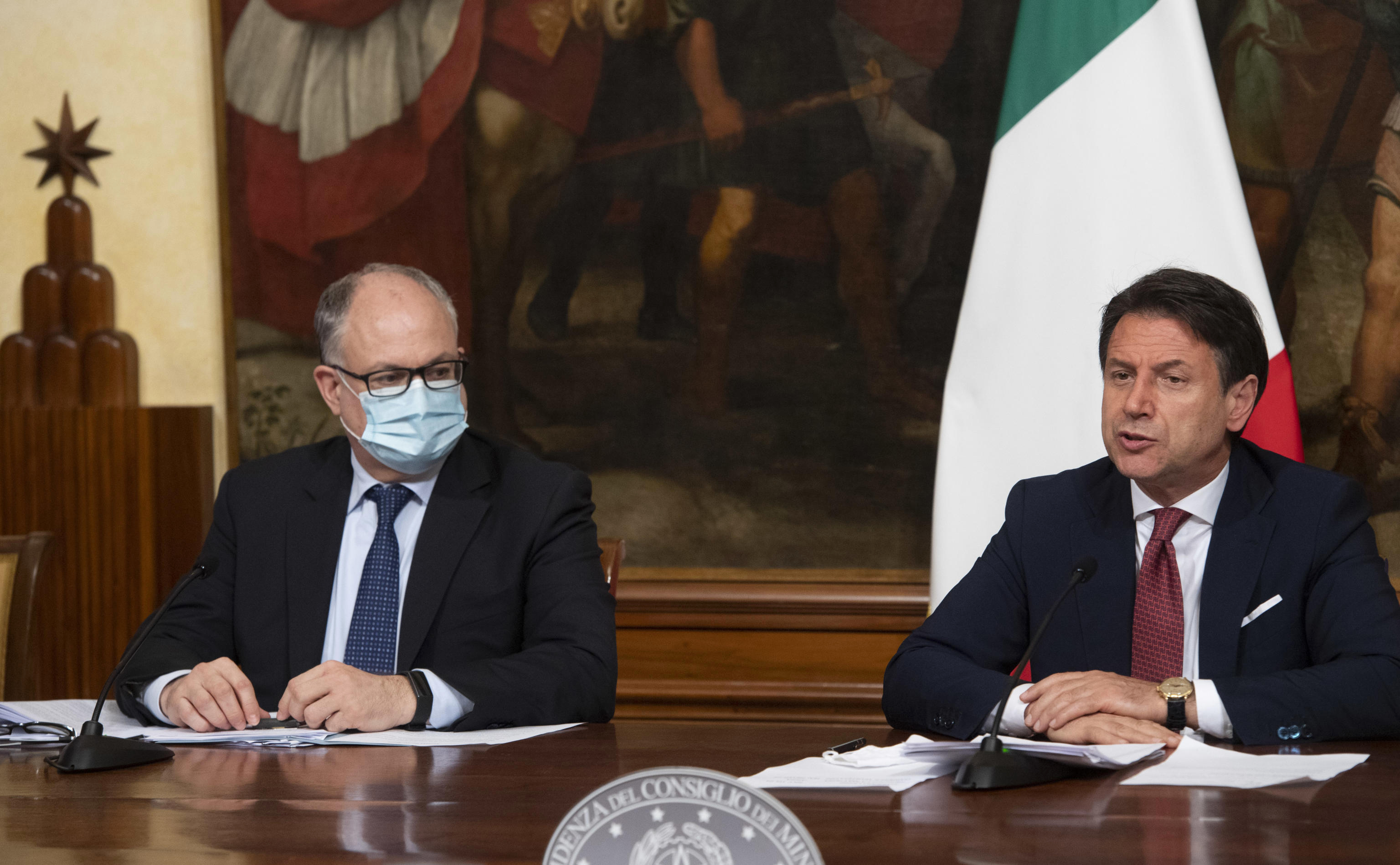 The Latest: Italy urges citizens to keep guard up on virus