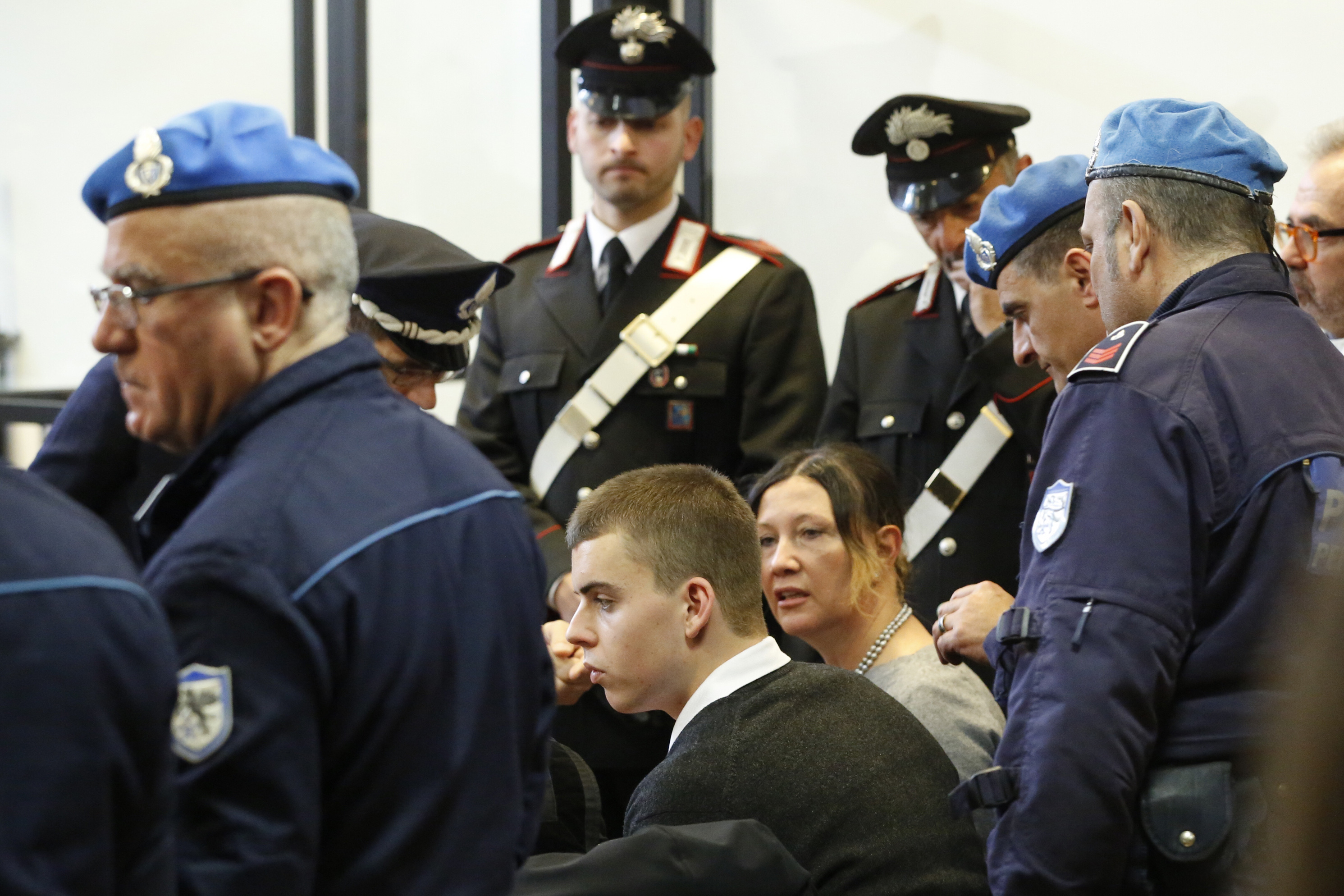 Trial begins for jailed American pals in policeman's slaying