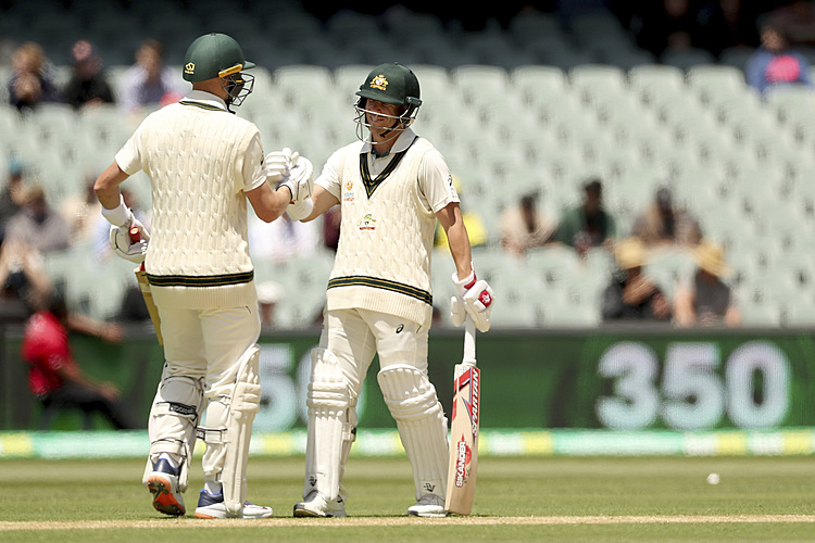 Warner, Smith pile on pain for Pakistan in day-night test
