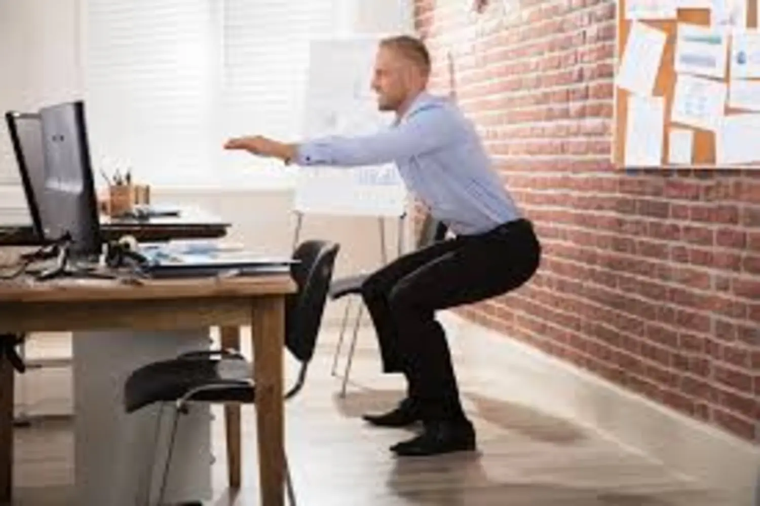 5 Easy Exercises to do at Your Desk to Ease Aches and Pains