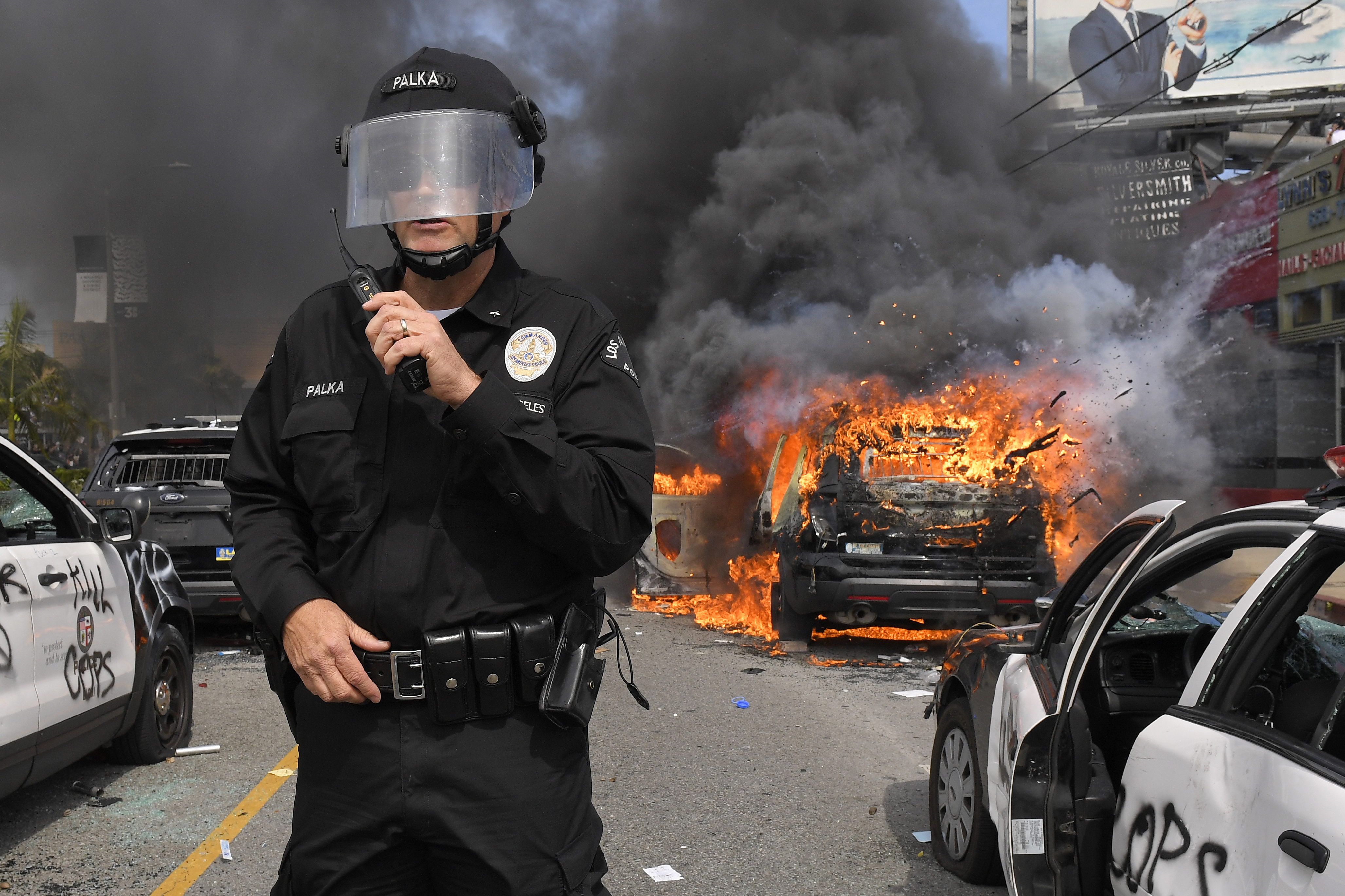 The Latest: Chicago mayor restricts vehicle, transit access