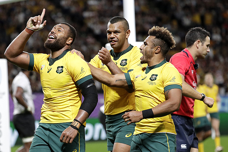 The Latest: Australia rallies to avoid upset against Fiji