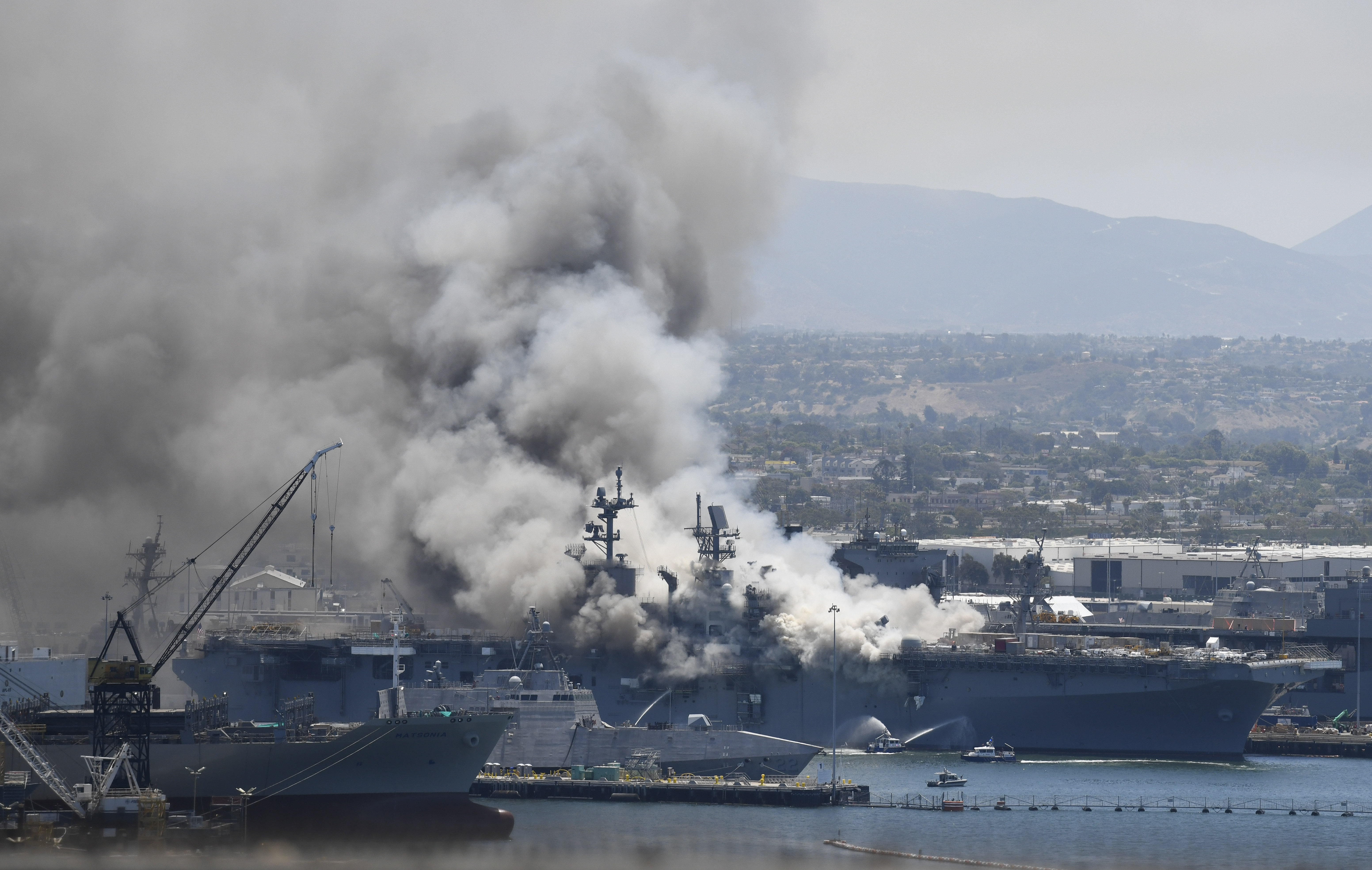Fire still burning on Navy ship in San Diego where 57 hurt