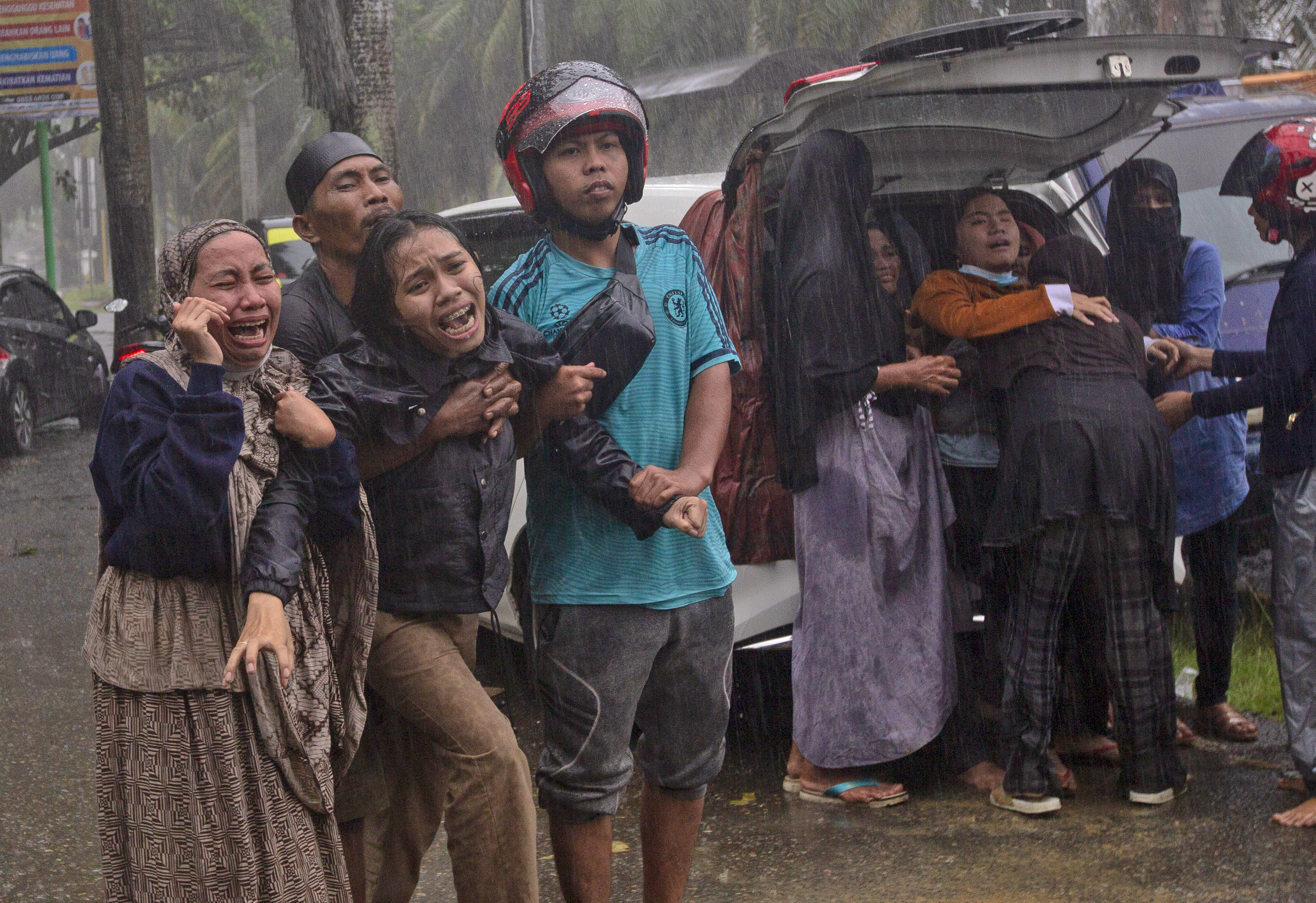 At least 42 dead as Indonesia quake topples homes, buildings