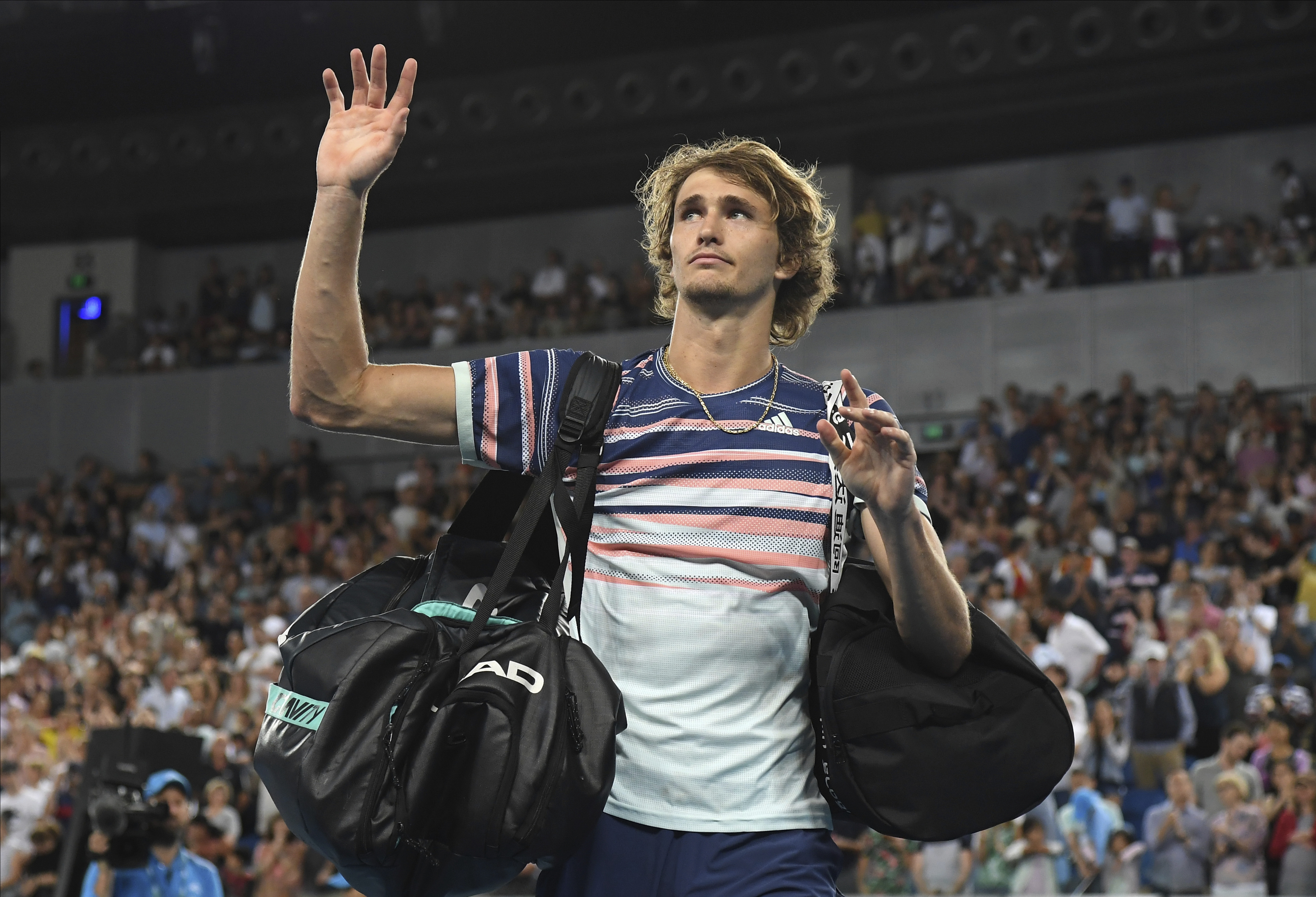 The Latest:  Zverev advances to 4th round at Australian Open