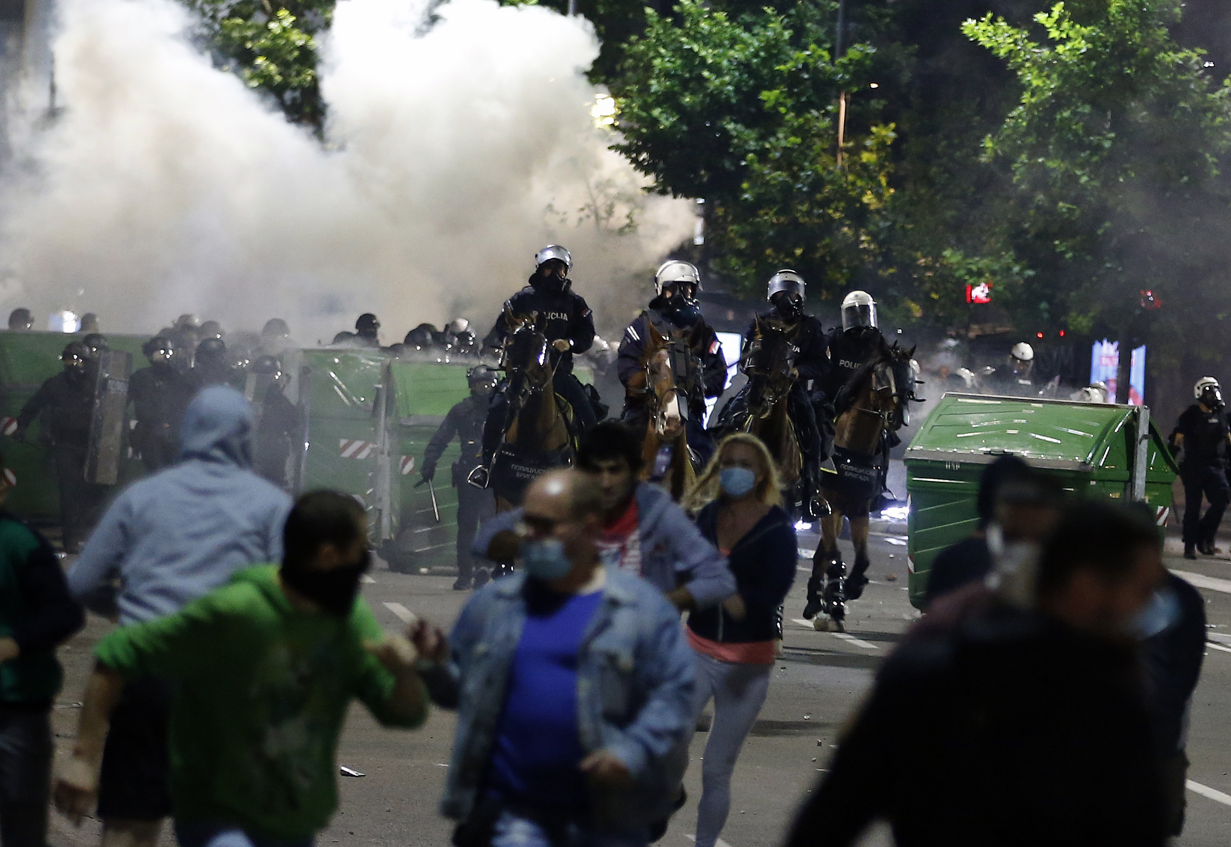 The Latest: Serbian police say 23 held, 60 hurt in clashes