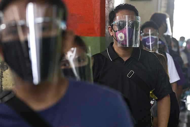 The Latest: Greek holiday island imposes extra restrictions