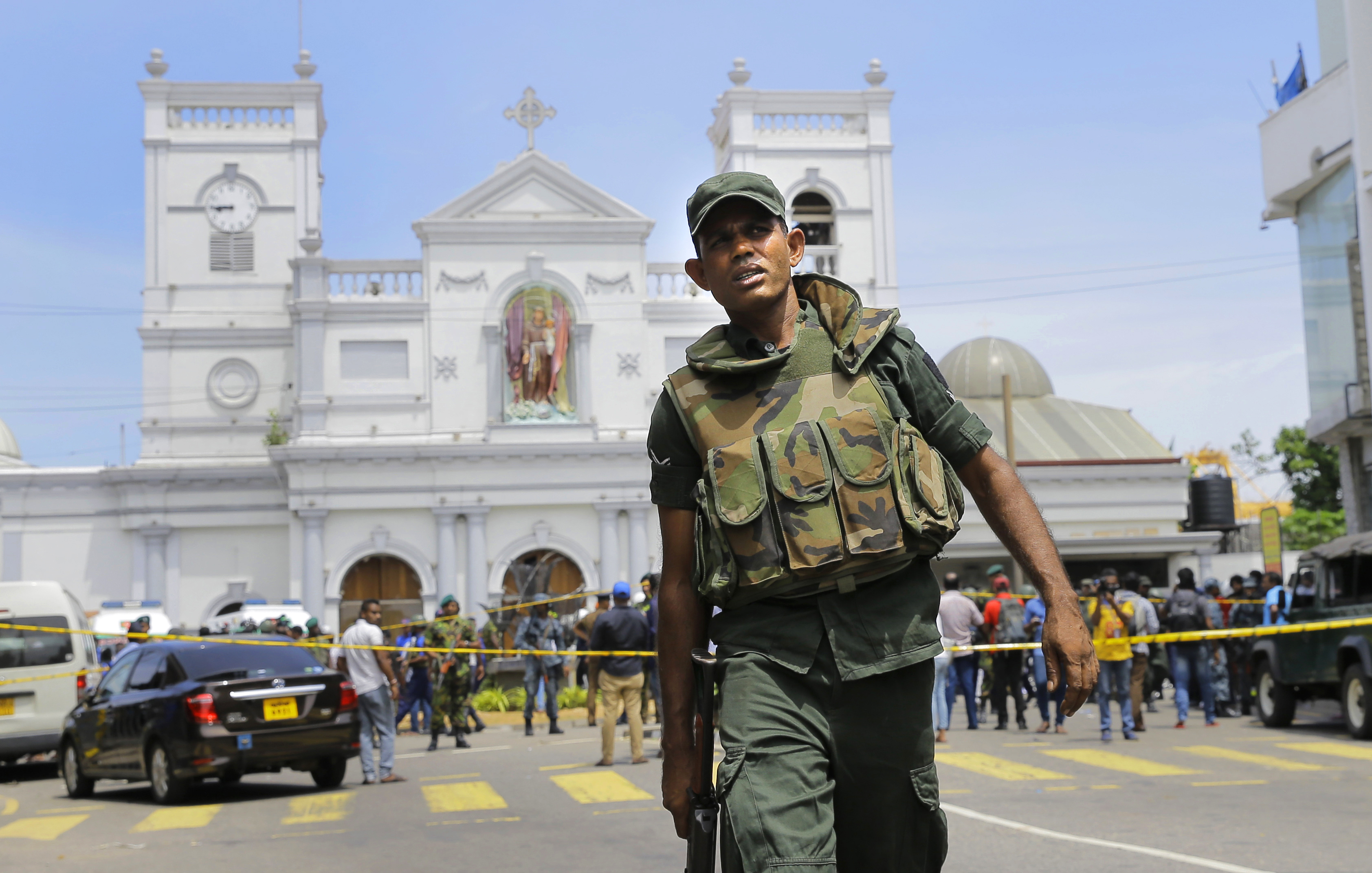 The Latest: Sri Lanka invokes war-time military powers