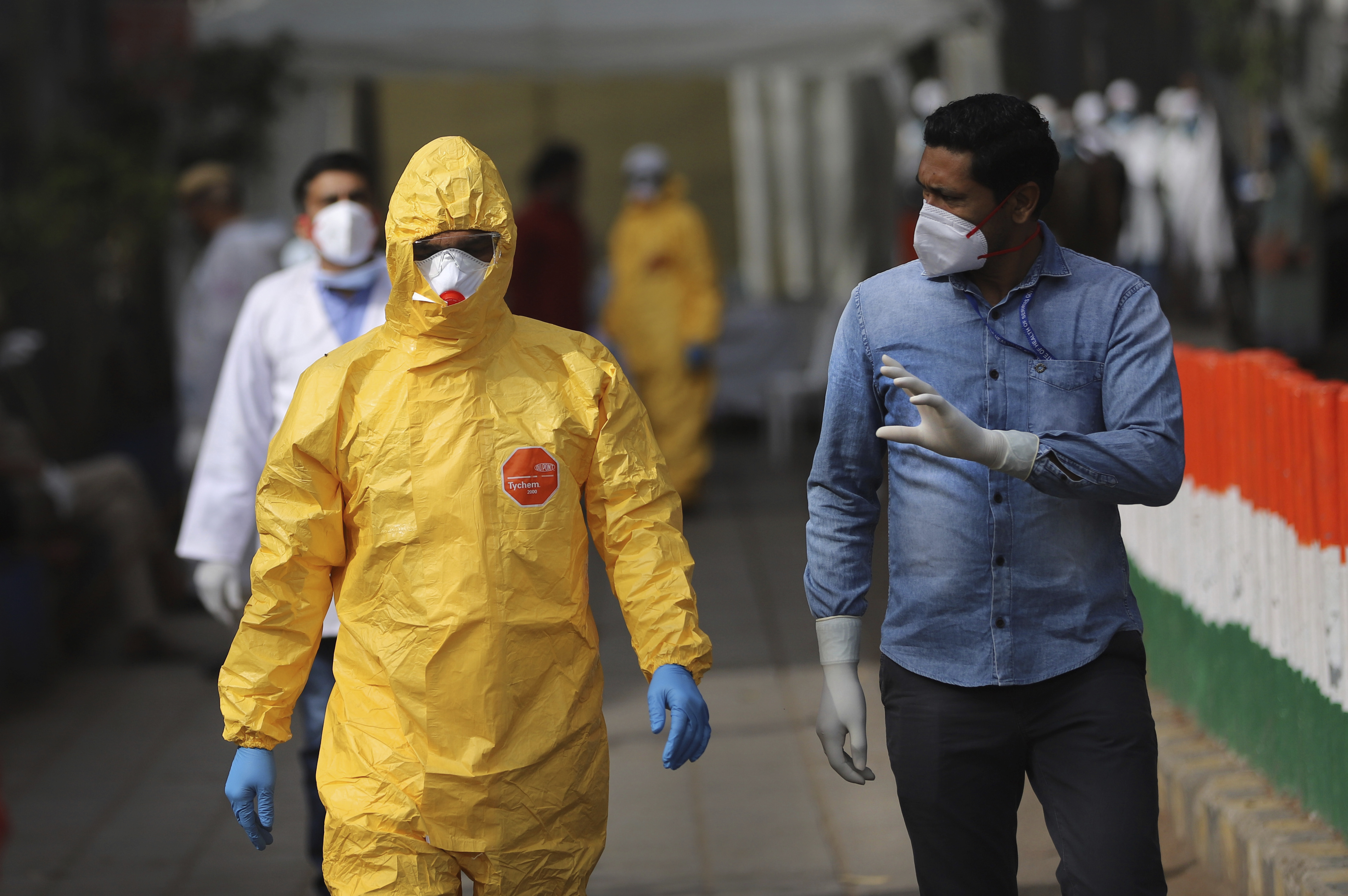 The Latest: India links virus cases to religious gathering