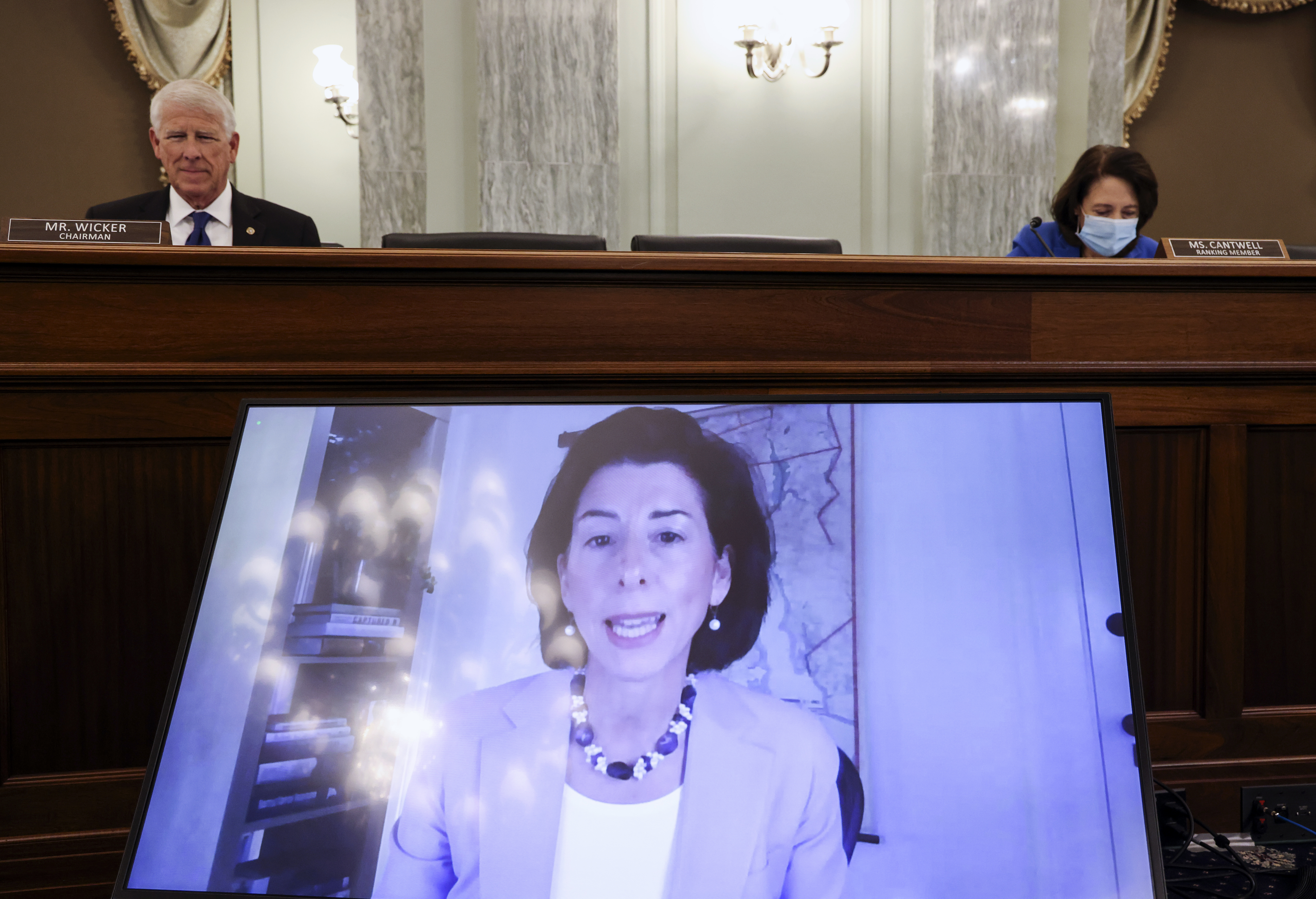 Biden's Commerce pick, Raimondo, voices tough line on China