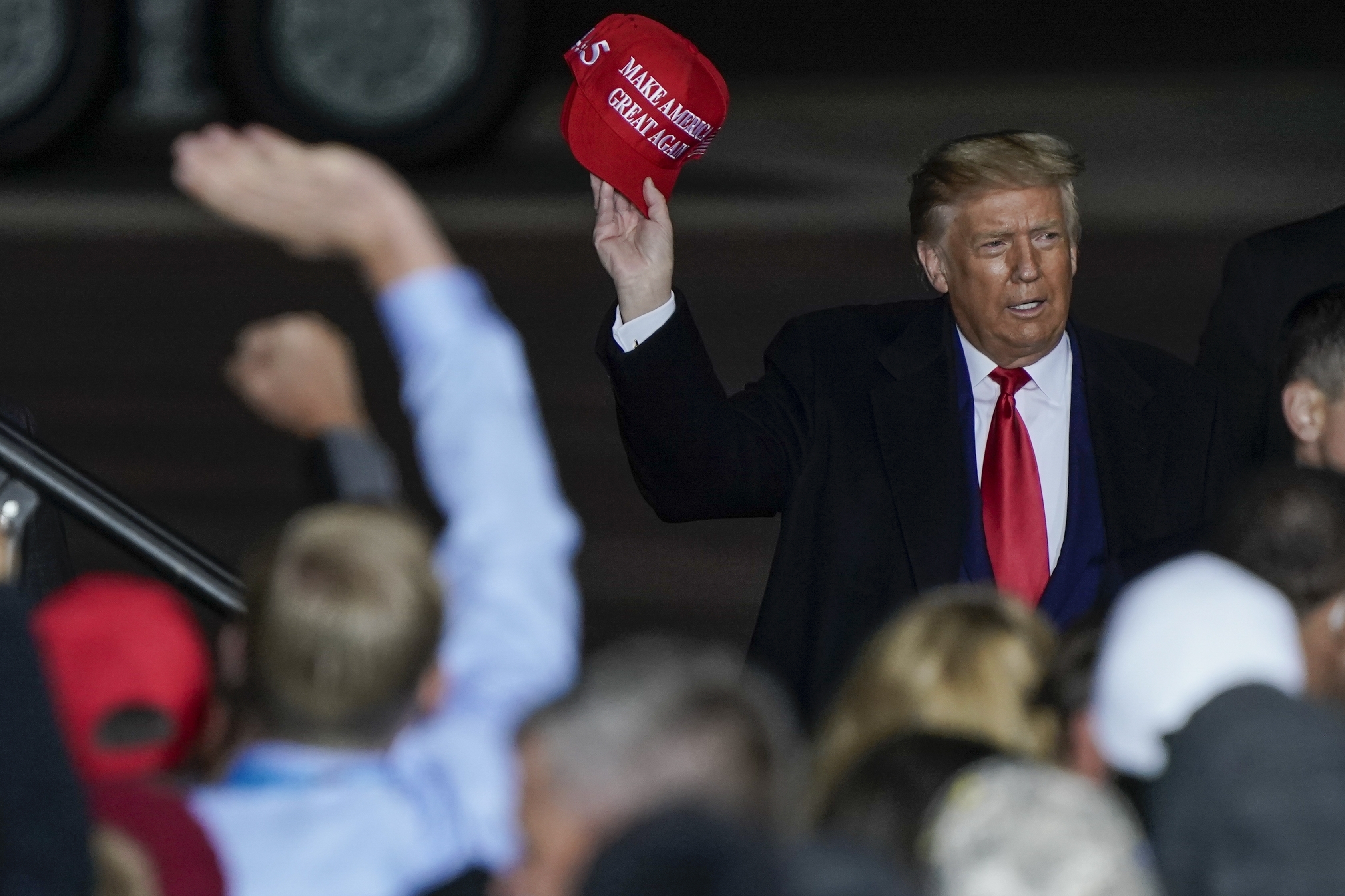 AP FACT CHECK: Trump's voting wrongs; Biden's trade miss