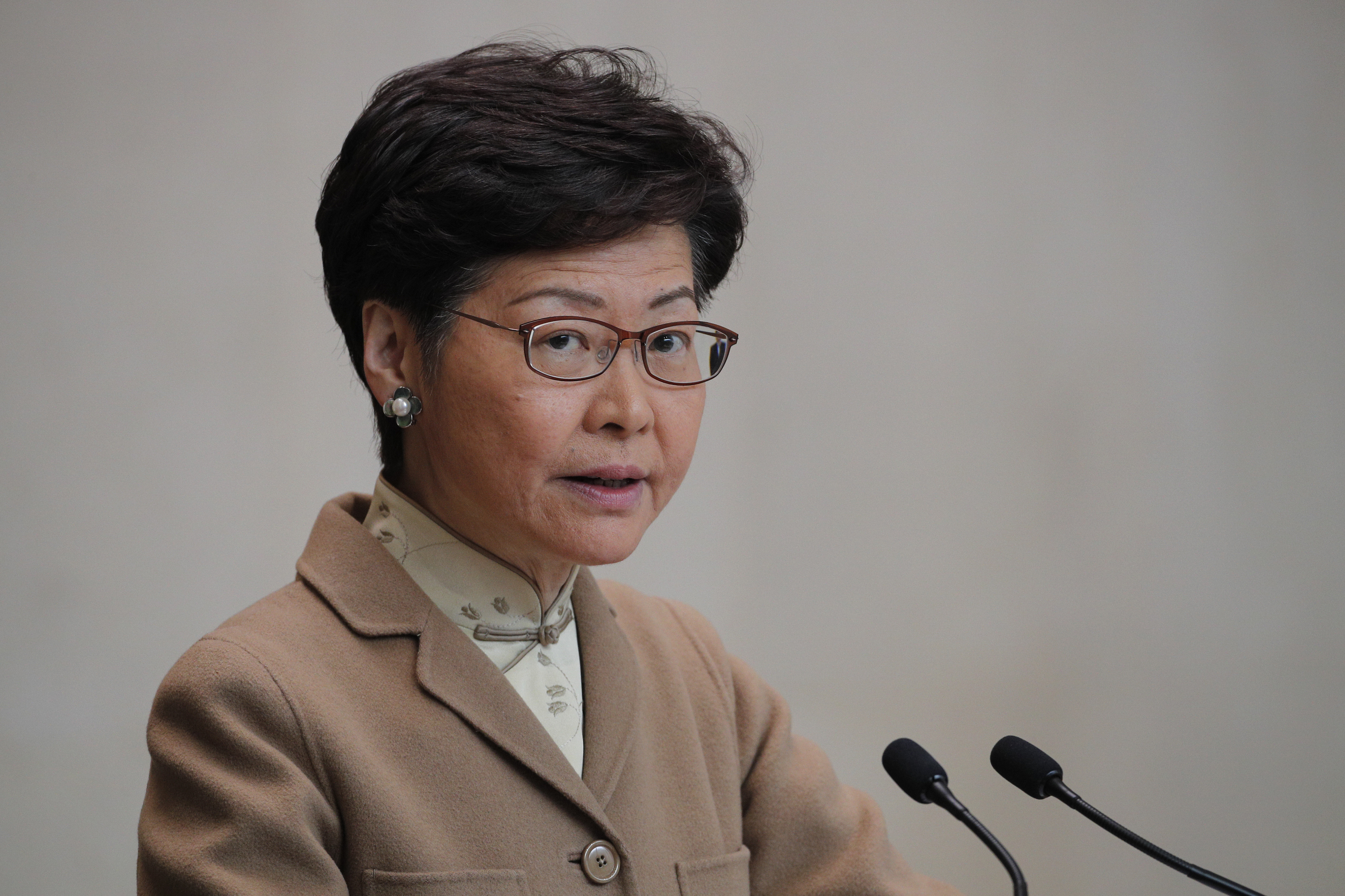 Hong Kong leader says new year will be a challenging one