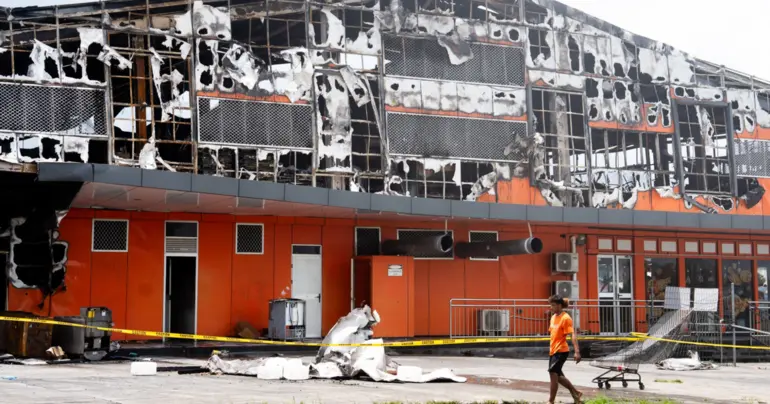 Firefighters work in Frankie Hypermarket aftermath
